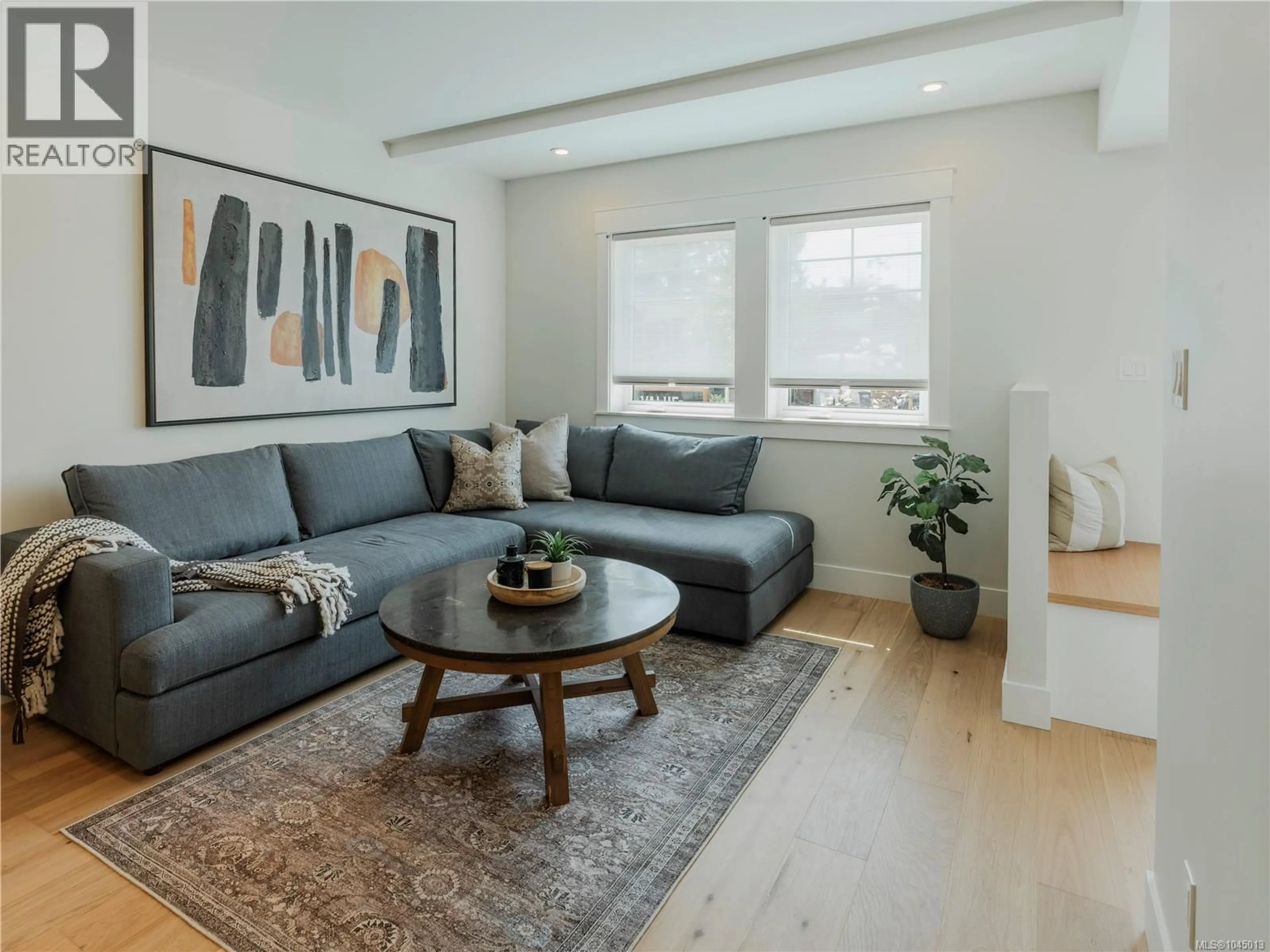 Living room with furniture, wood/laminate floor for 3 - 1830 ALLENBY STREET, Saanich British Columbia V8R3B7