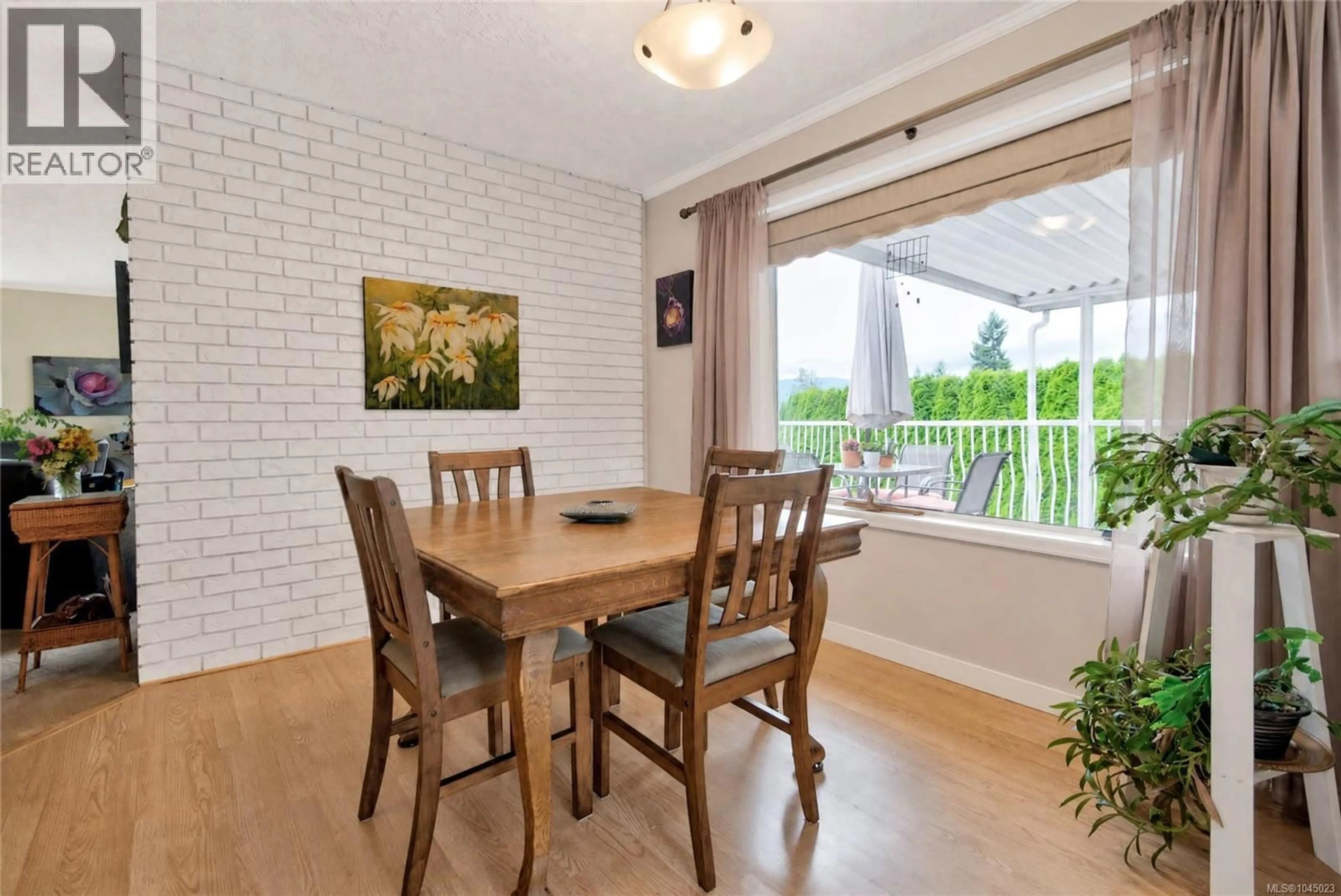 Dining room, wood/laminate floor for 356 REES ROAD, Courtenay British Columbia V9N6B9