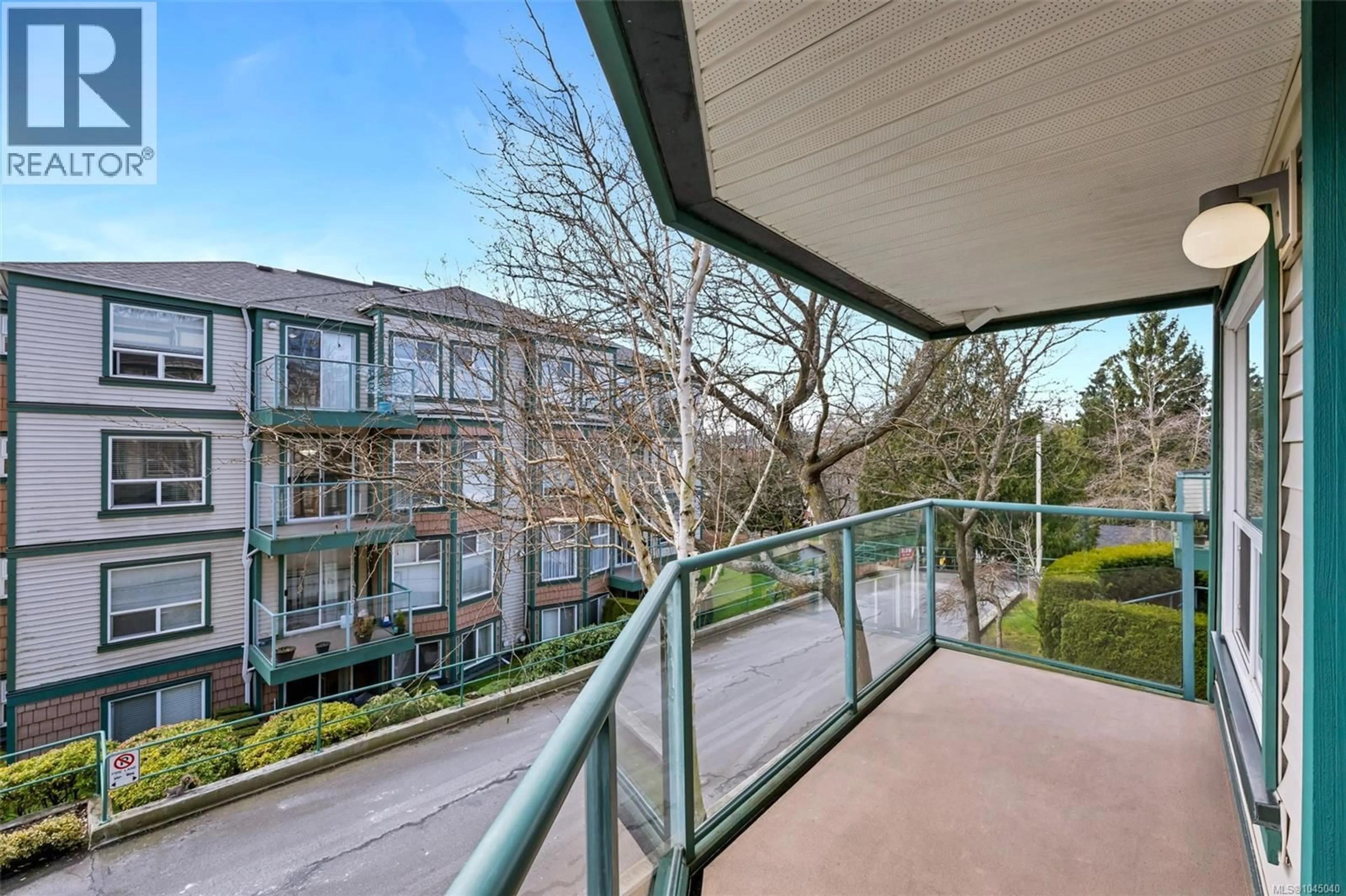 Balcony in the apartment, city buildings view from balcony for 212 - 899 DARWIN AVENUE, Saanich British Columbia V8X2X7