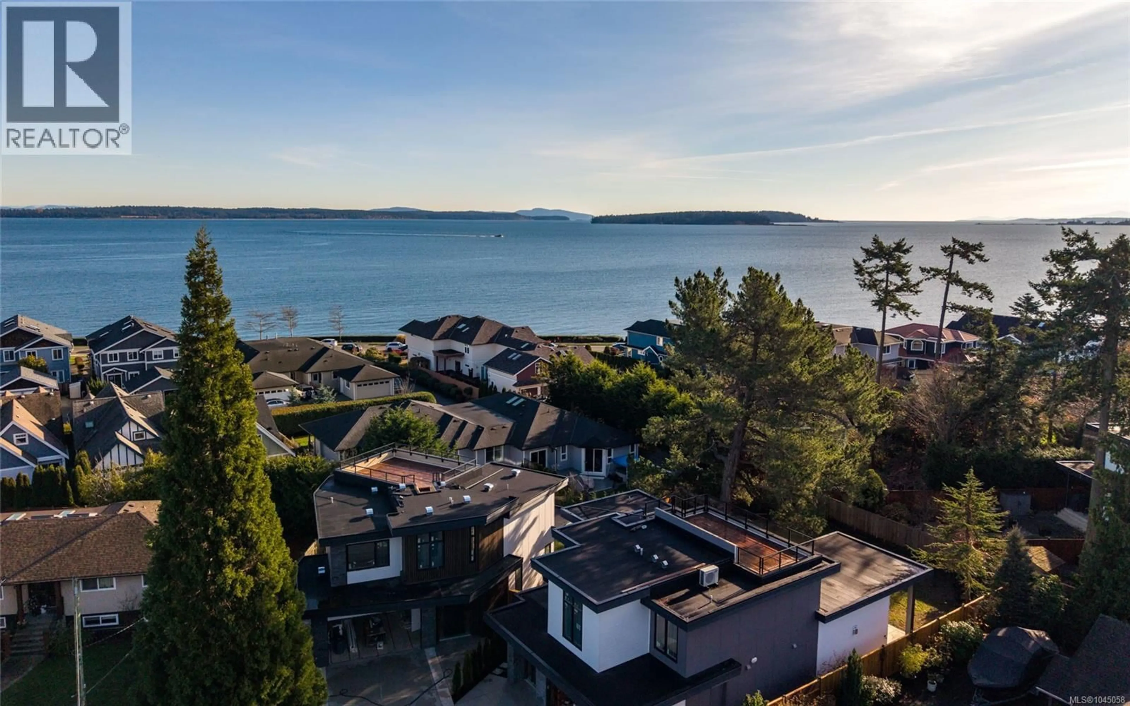 A pic from outside/outdoor area/front of a property/back of a property/a pic from drone, water/lake/river/ocean view for 2293 ADELA PLACE, Sidney British Columbia V8L1R2