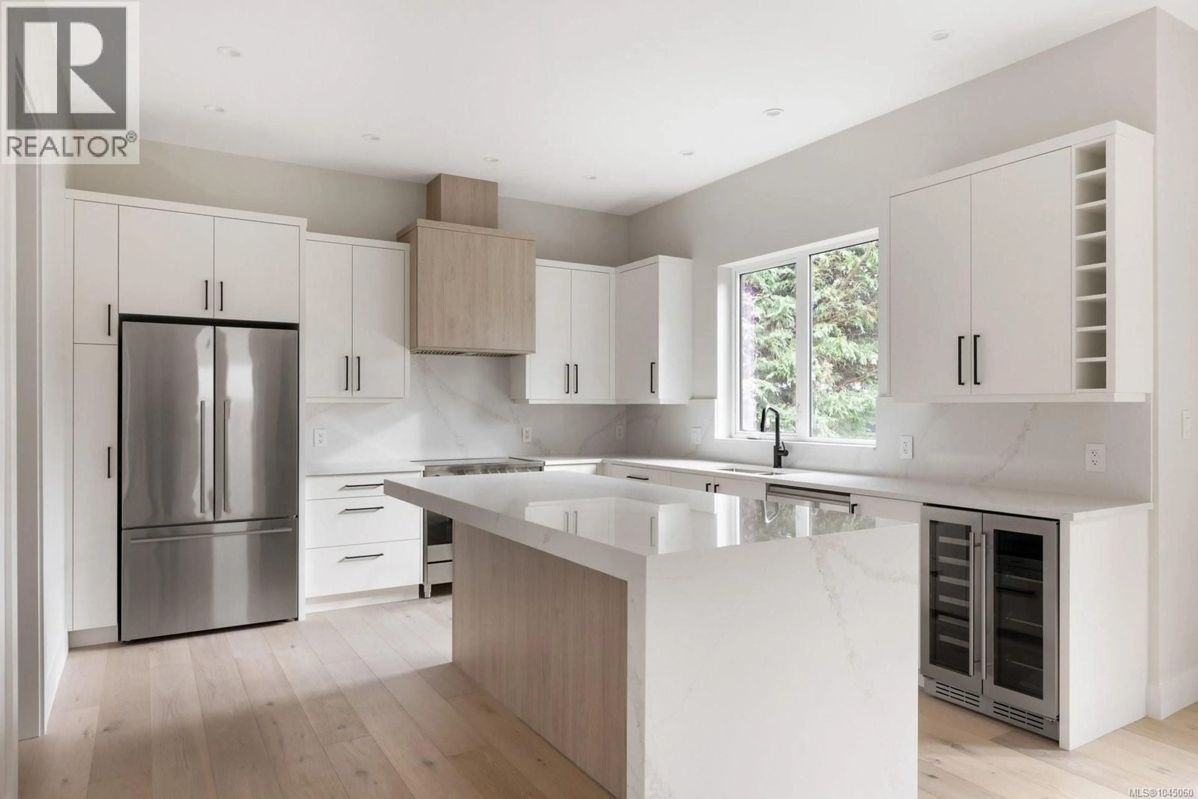 Contemporary kitchen, wood/laminate floor for 2295 ADELA PLACE, Sidney British Columbia V8L1R2