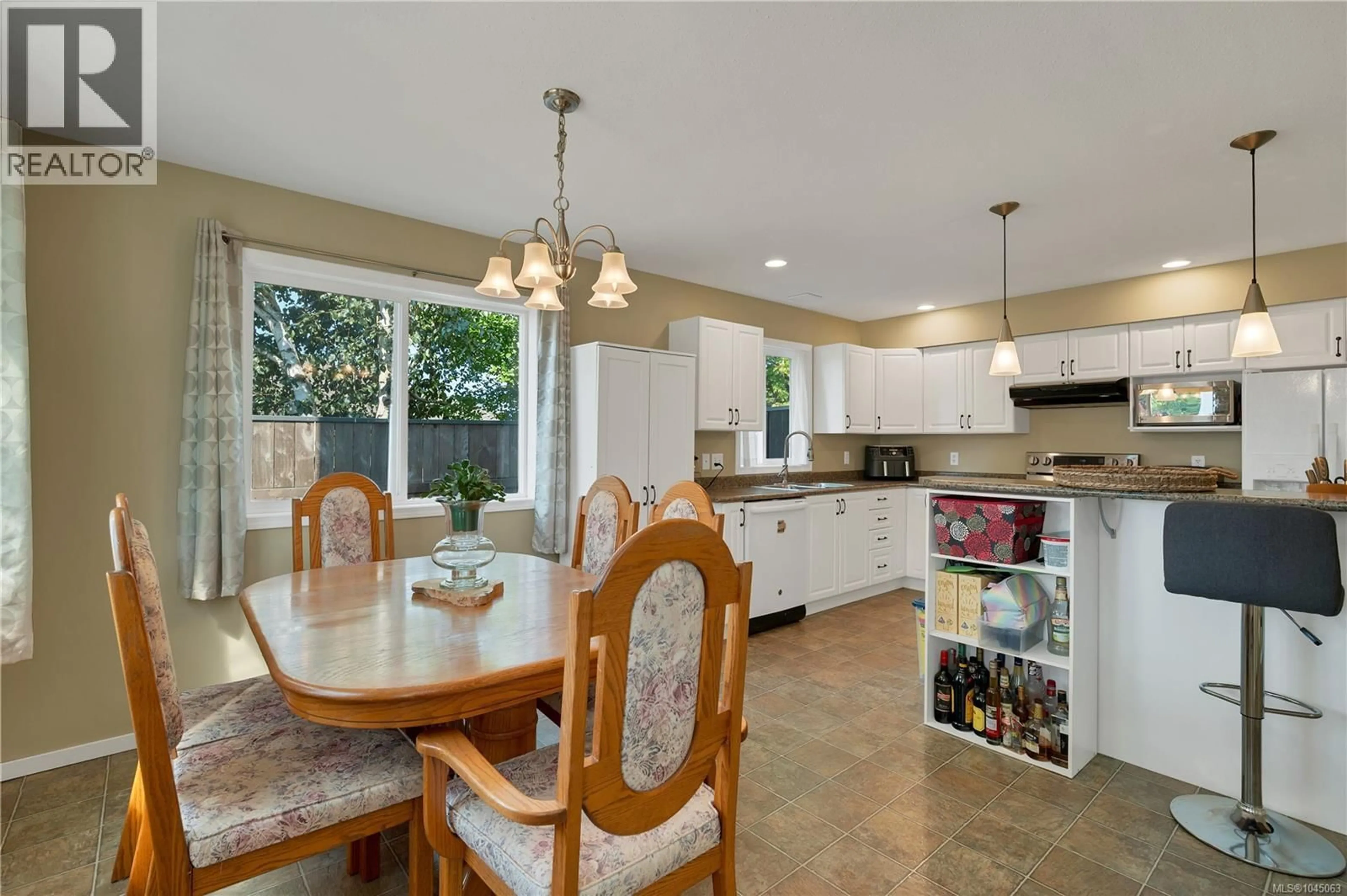 Open concept kitchen, ceramic/tile floor for 391 NILUHT ROAD, Campbell River British Columbia V9W8G5