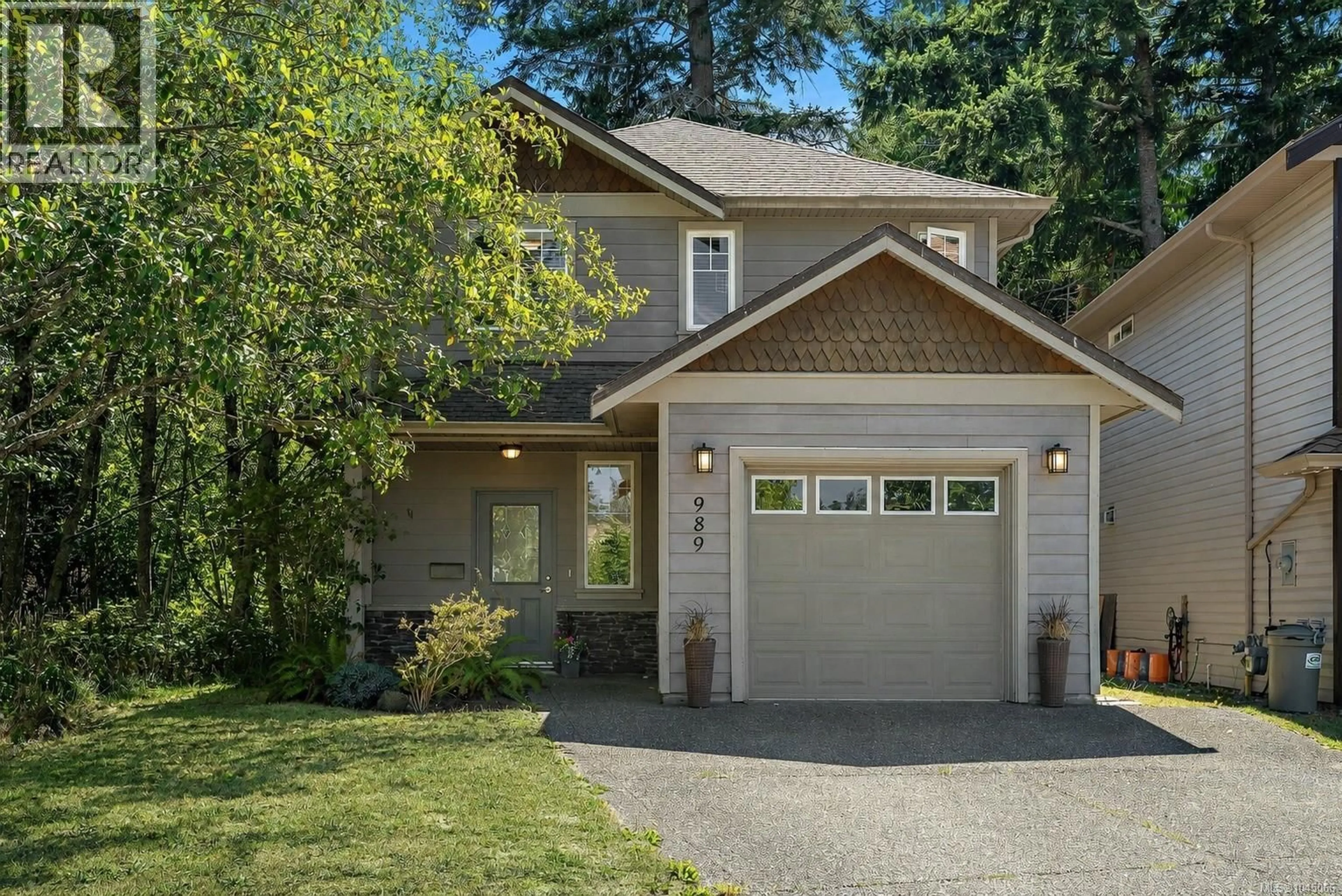 Home with brick exterior material, street for 989 WILD POND LANE, Langford British Columbia V9C4M7