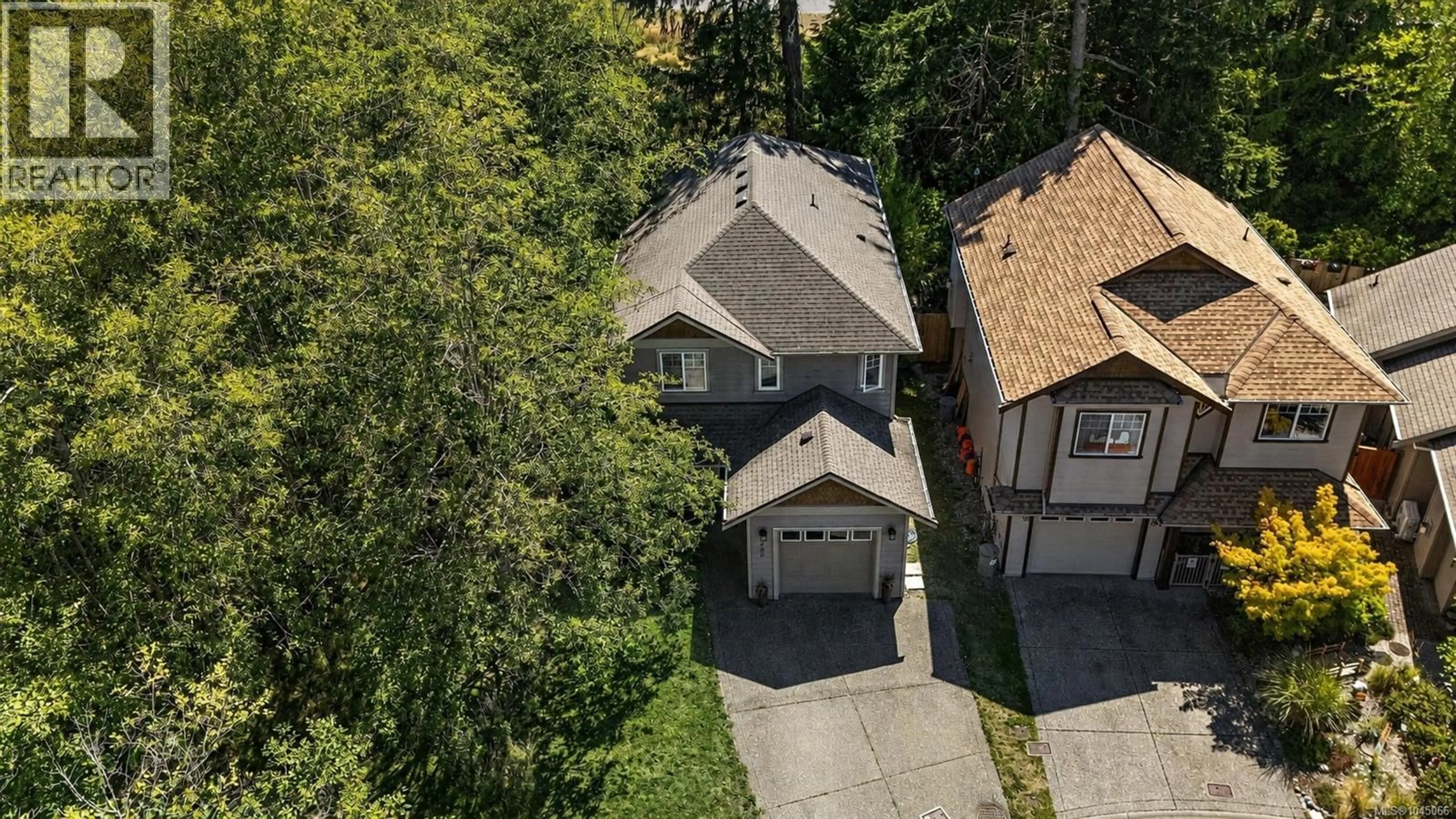 A pic from outside/outdoor area/front of a property/back of a property/a pic from drone, street for 989 WILD POND LANE, Langford British Columbia V9C4M7