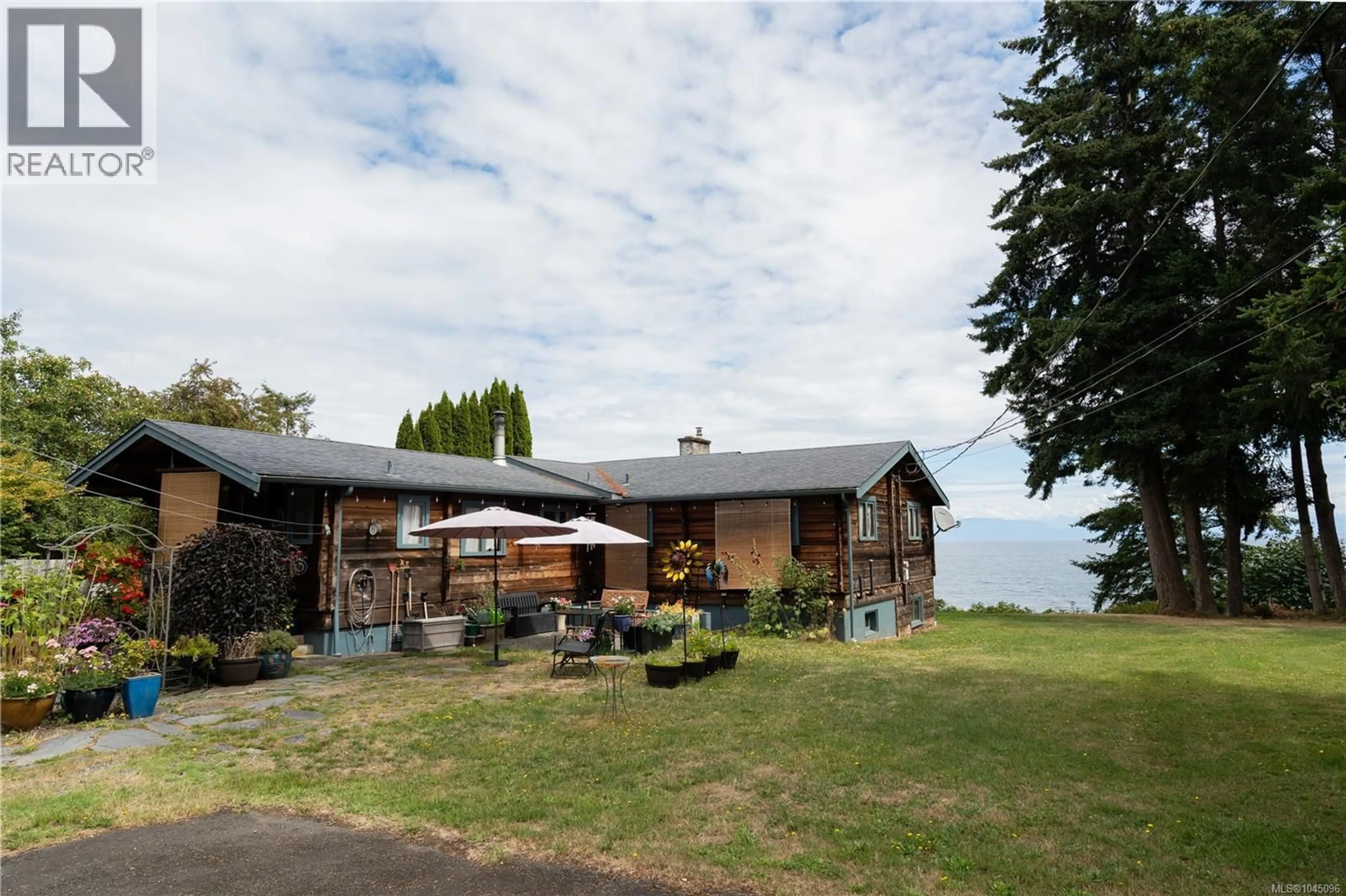 A pic from outside/outdoor area/front of a property/back of a property/a pic from drone, mountain view for 2310 SEABANK ROAD, Courtenay British Columbia V9J1Y2
