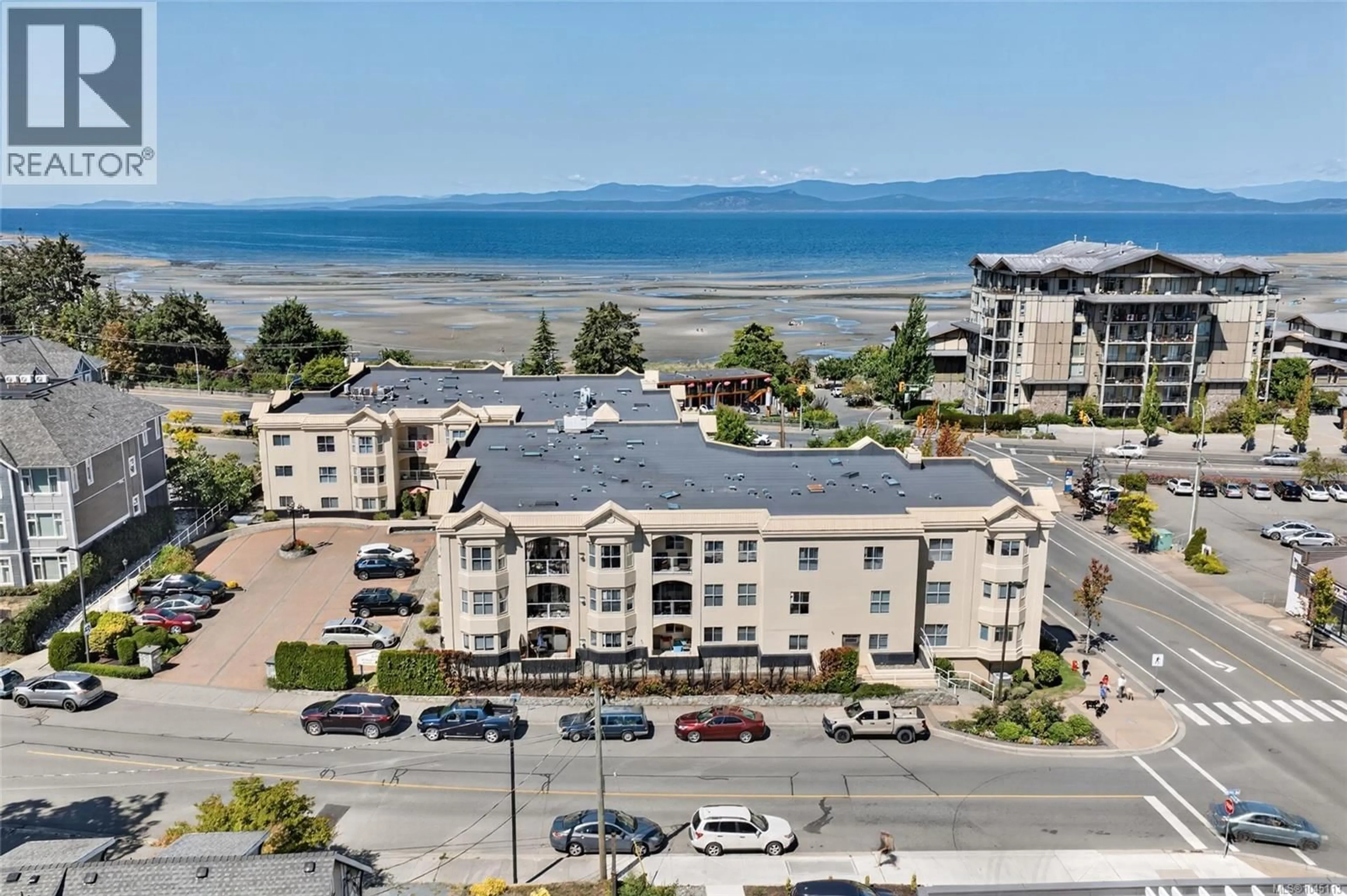 A pic from outside/outdoor area/front of a property/back of a property/a pic from drone, water/lake/river/ocean view for 201 - 220 ISLAND HIGHWAY WEST, Parksville British Columbia V9P2P3