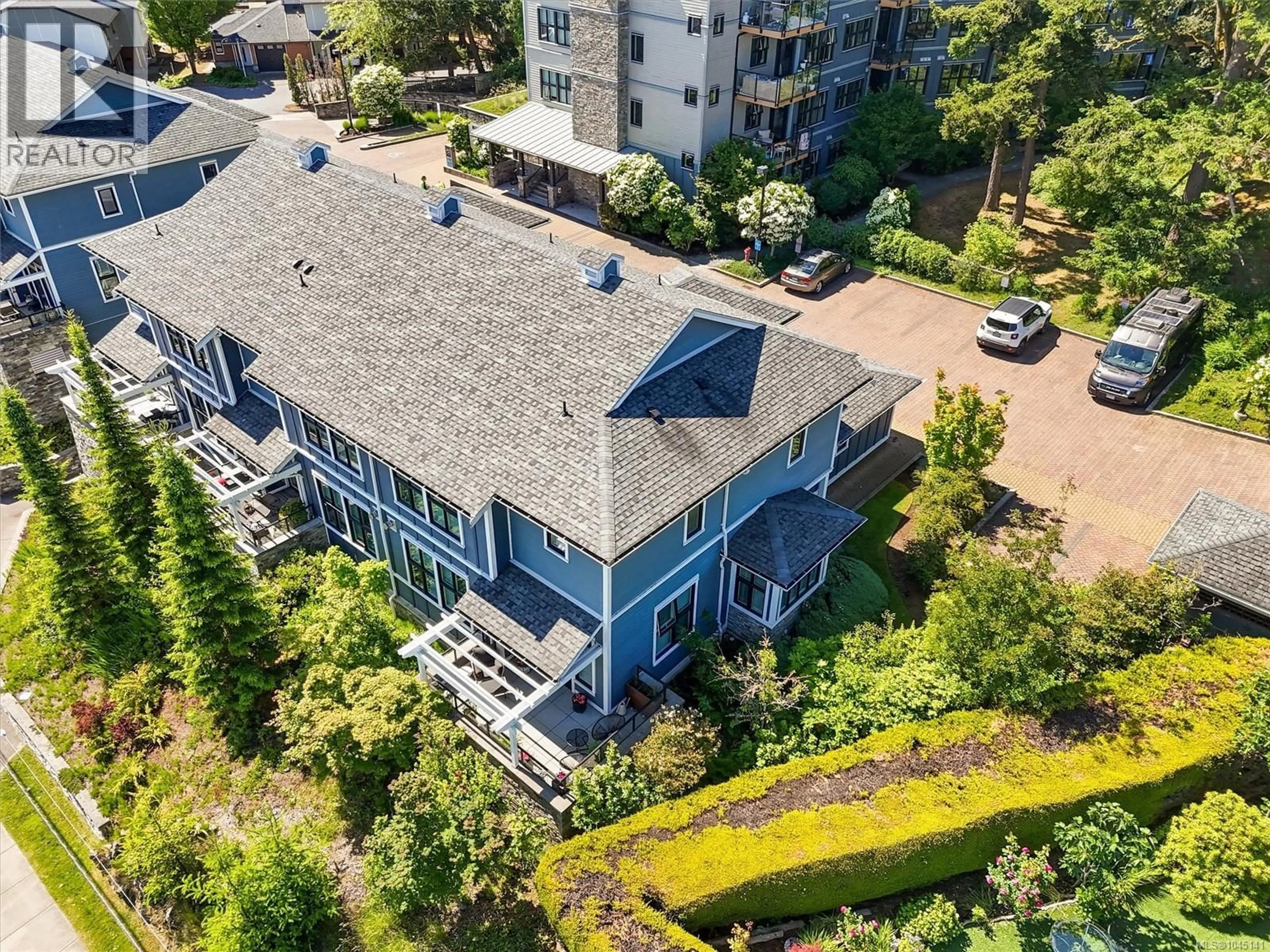 A pic from outside/outdoor area/front of a property/back of a property/a pic from drone, unknown for 101 - 3916 CAREY ROAD, Saanich British Columbia V8Z4E2