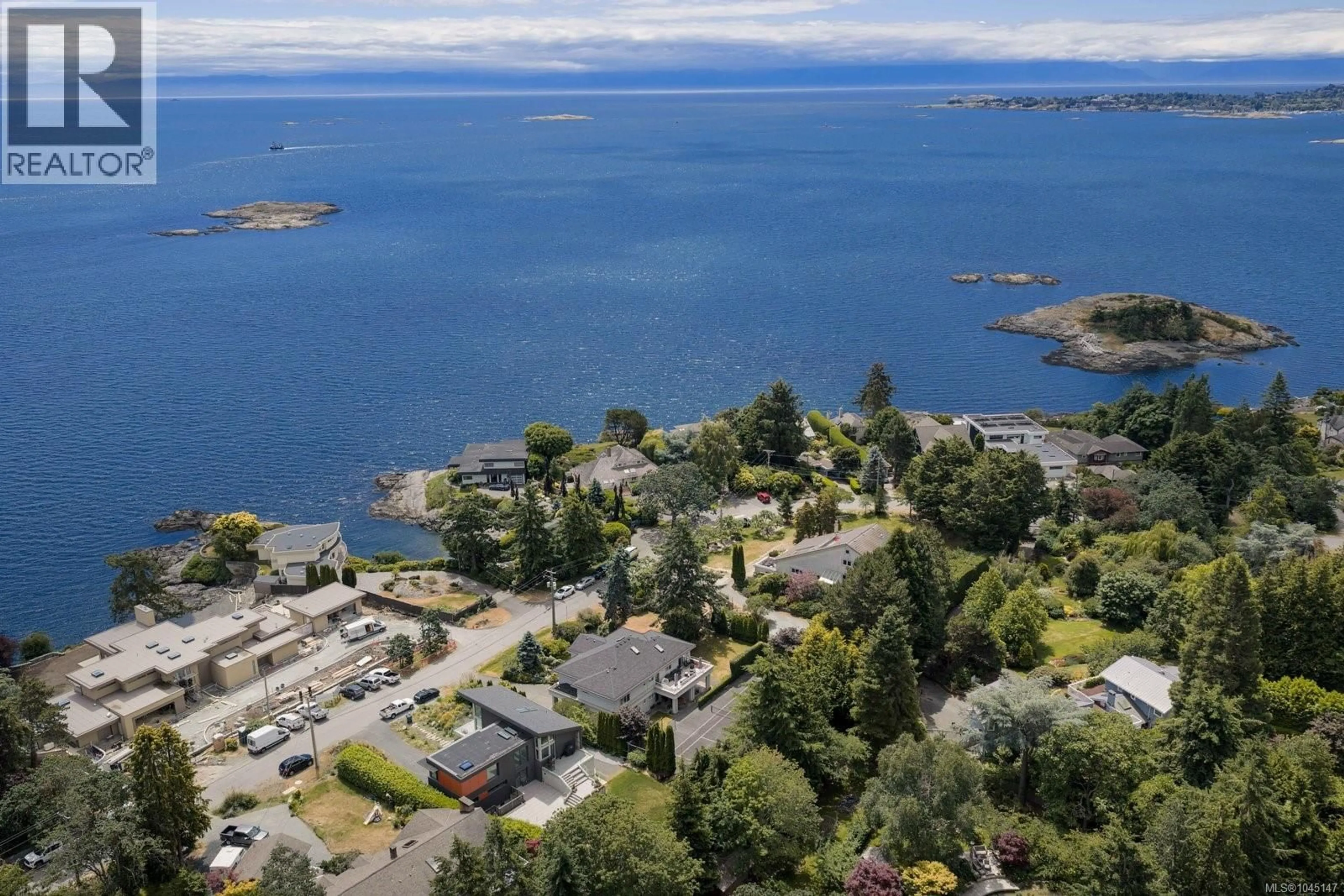 A pic from outside/outdoor area/front of a property/back of a property/a pic from drone, water/lake/river/ocean view for 2980 SEA VIEW ROAD, Saanich British Columbia V8N1L1