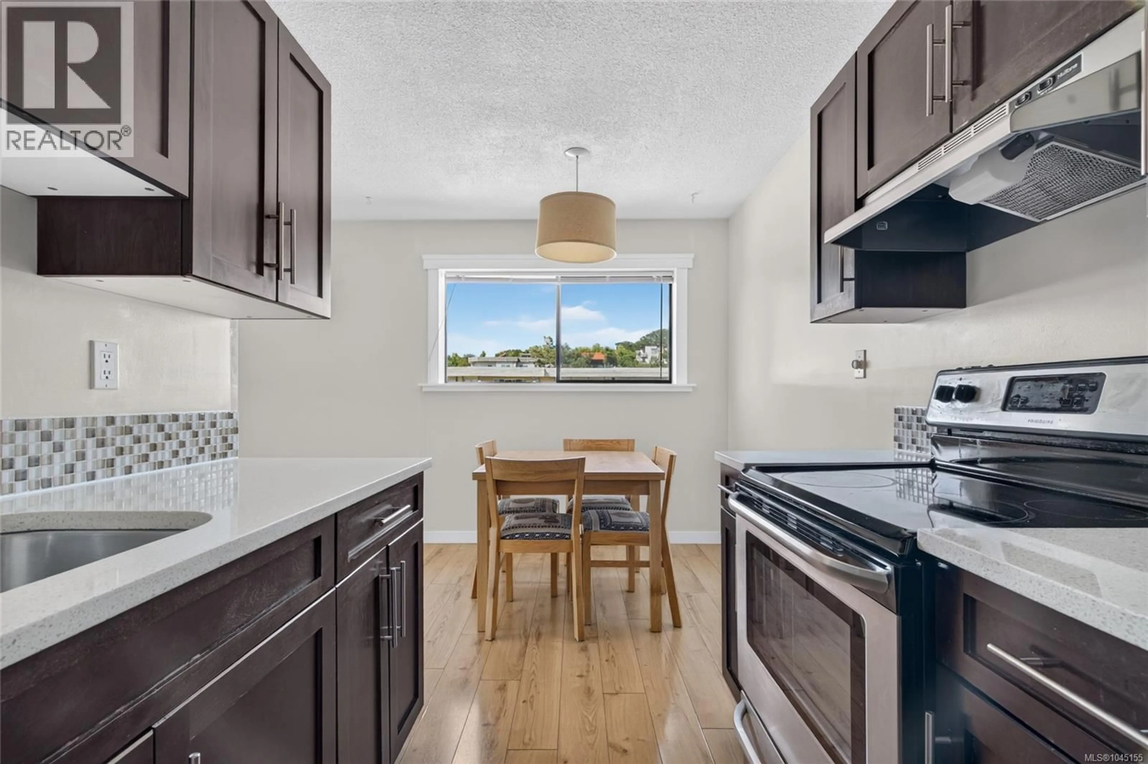 Open concept kitchen, unknown for 313 - 3277 GLASGOW AVENUE, Saanich British Columbia V8X1M3