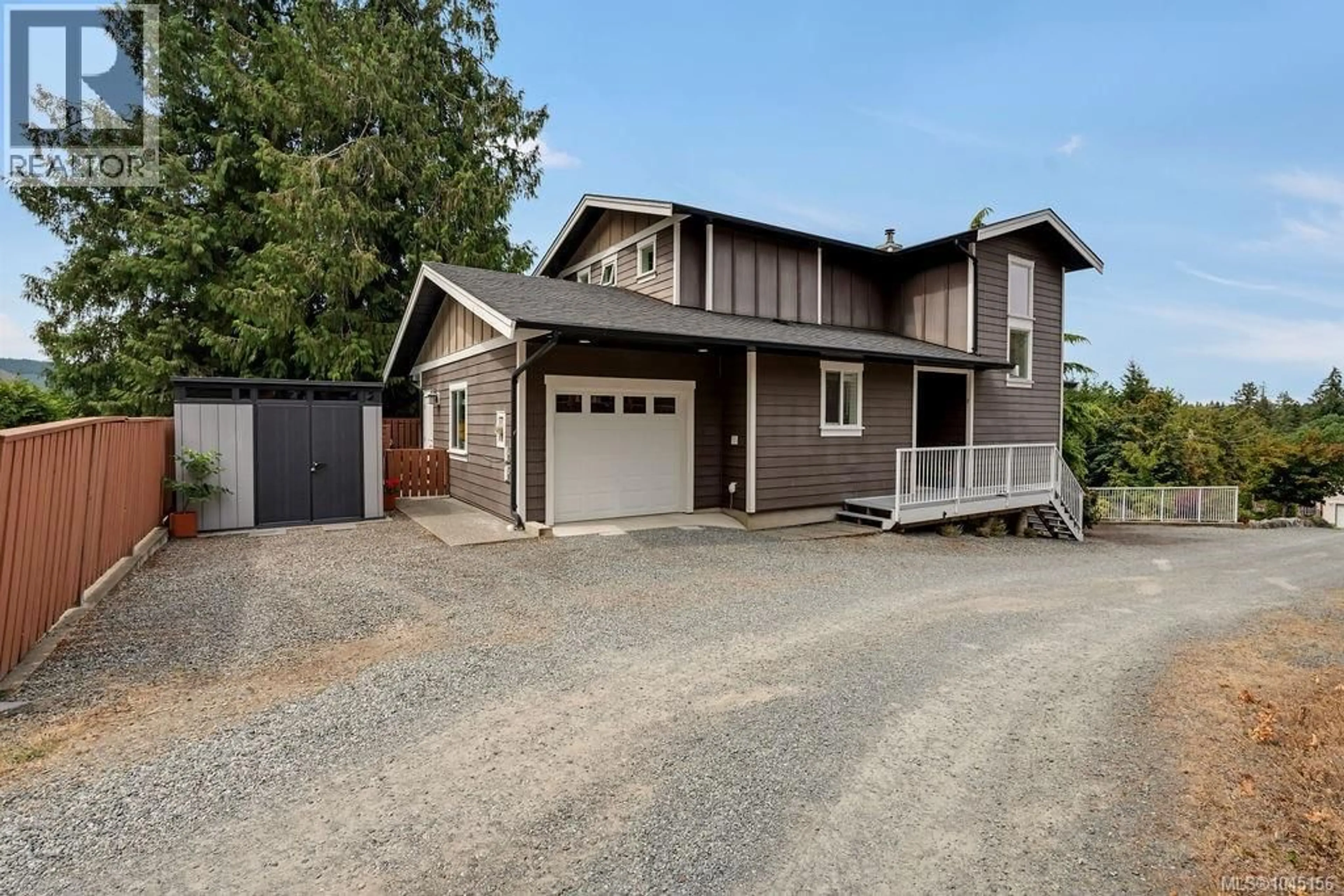 Home with vinyl exterior material, street for 1848 NORBURY ROAD, Shawnigan Lake British Columbia V8H3B4