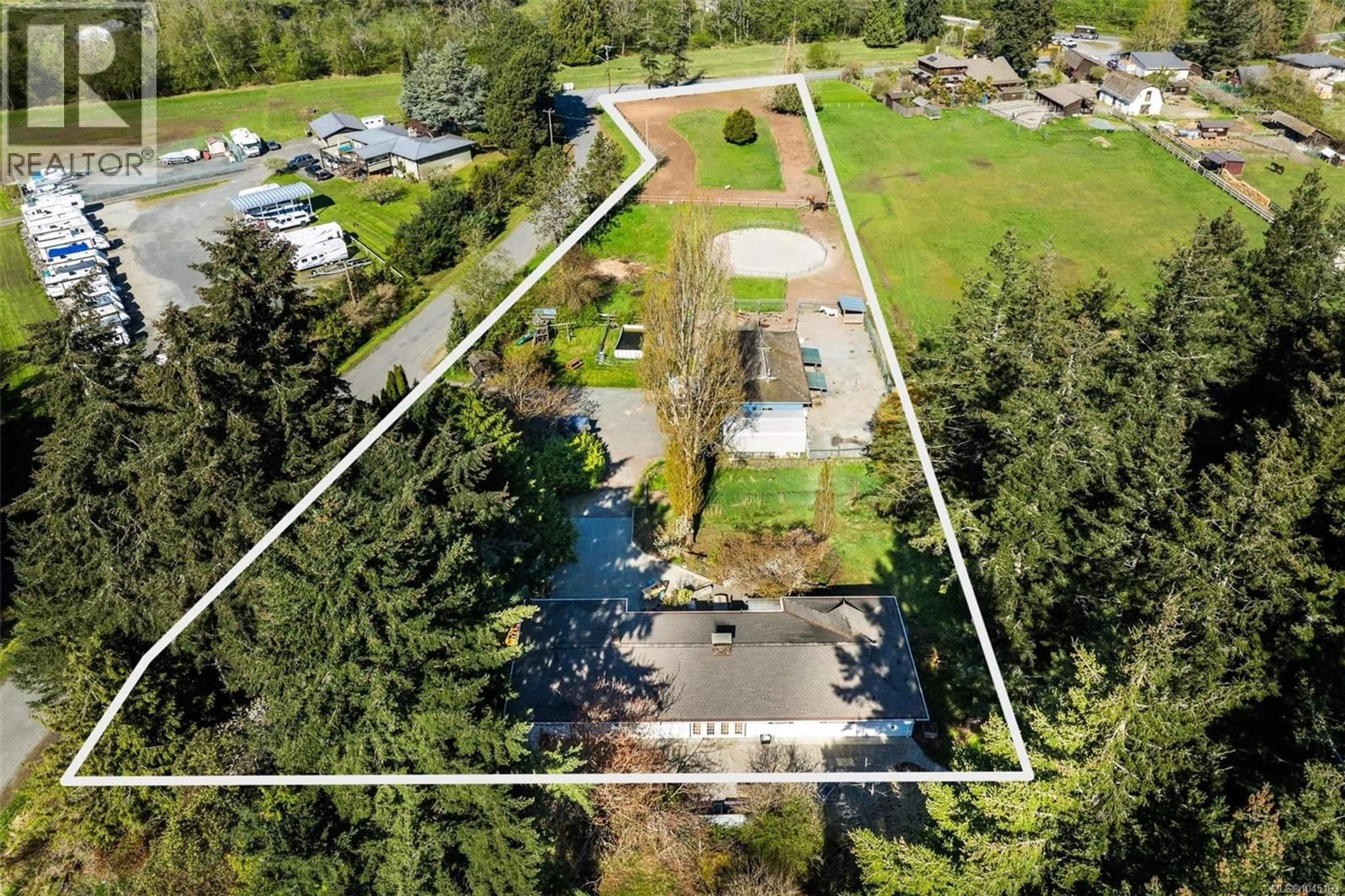 A pic from outside/outdoor area/front of a property/back of a property/a pic from drone, street for 946 KLAHANIE DRIVE, Langford British Columbia V9C3X2