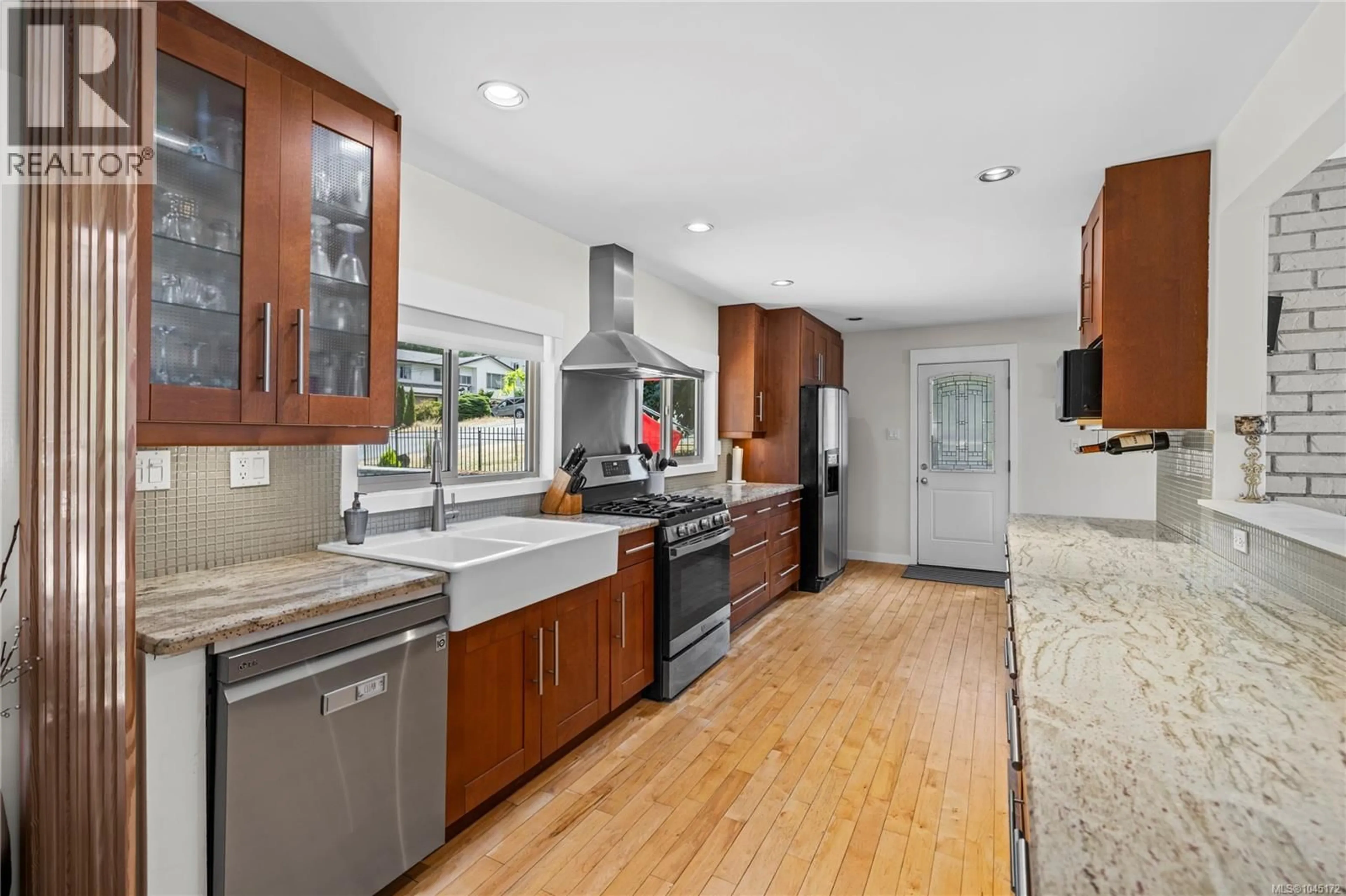Open concept kitchen, ceramic/tile floor for 5567 VENTURA DRIVE, Nanaimo British Columbia V9T5M6