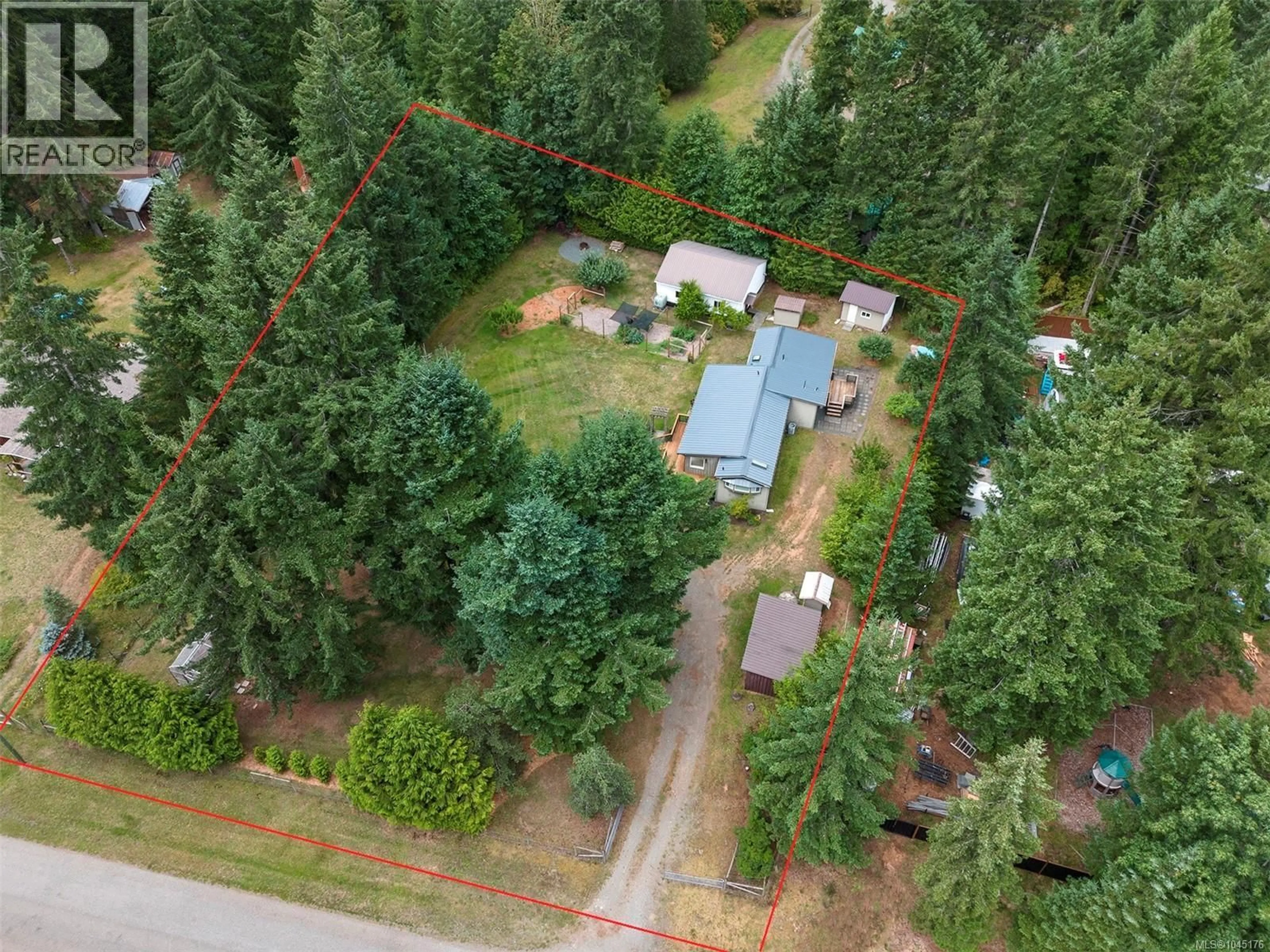 A pic from outside/outdoor area/front of a property/back of a property/a pic from drone, forest/trees view for 3713 JAMES CRESCENT, Black Creek British Columbia V9J1E9
