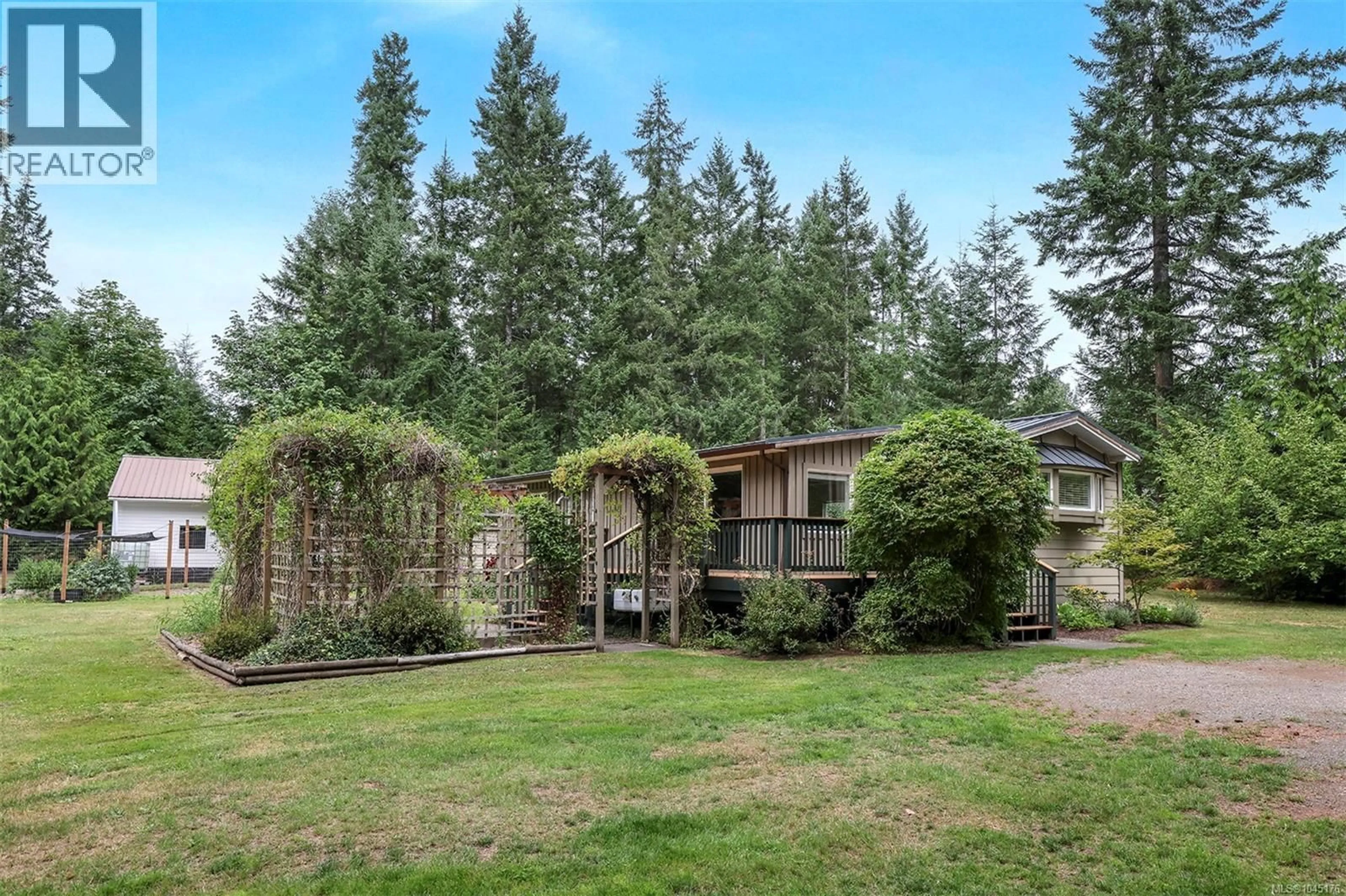 A pic from outside/outdoor area/front of a property/back of a property/a pic from drone, unknown for 3713 JAMES CRESCENT, Black Creek British Columbia V9J1E9