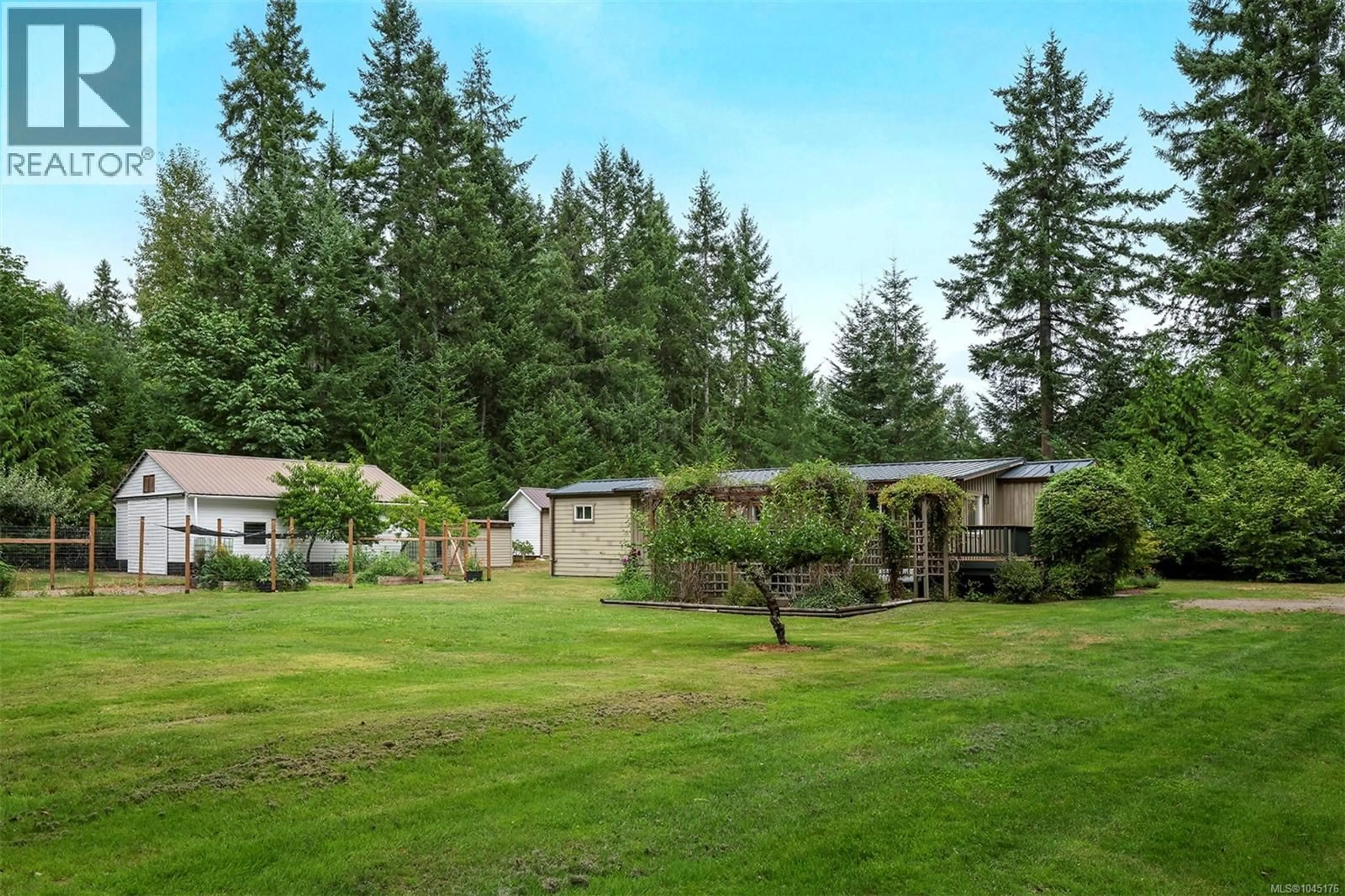 A pic from outside/outdoor area/front of a property/back of a property/a pic from drone, forest/trees view for 3713 JAMES CRESCENT, Black Creek British Columbia V9J1E9