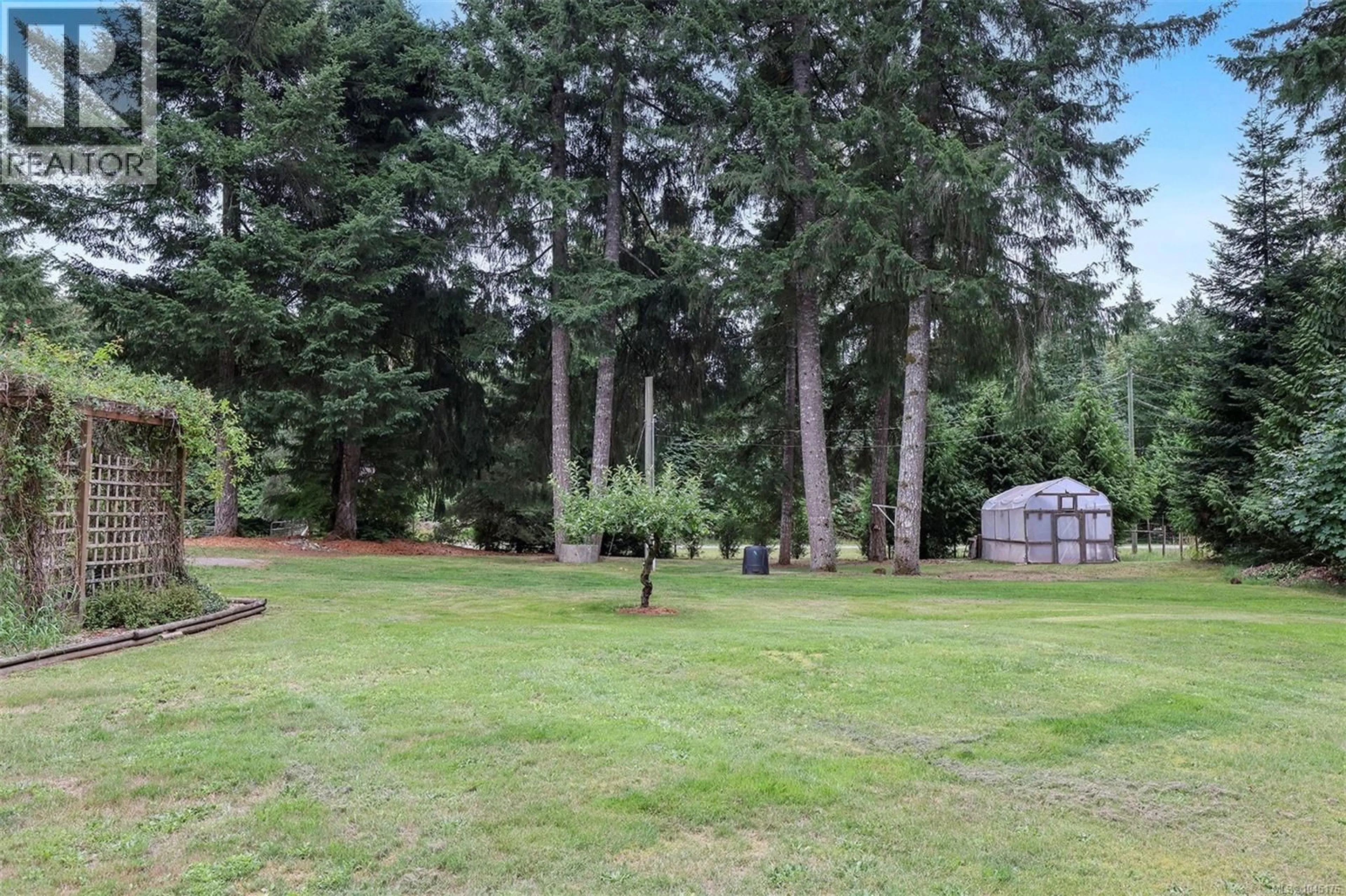 A pic from outside/outdoor area/front of a property/back of a property/a pic from drone, forest/trees view for 3713 JAMES CRESCENT, Black Creek British Columbia V9J1E9