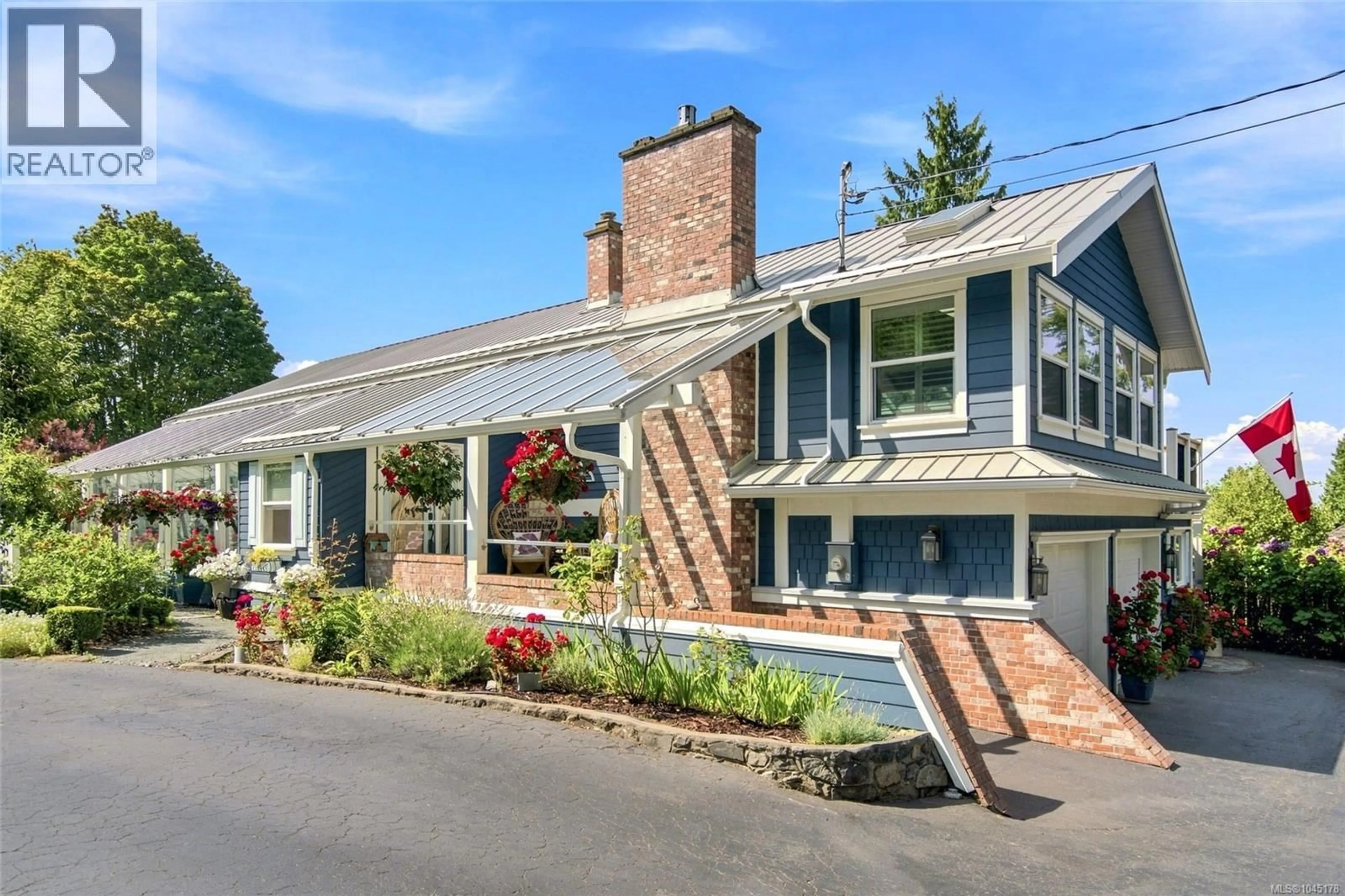 Home with brick exterior material, street for 549 MEMORIAL AVENUE, Qualicum Beach British Columbia V9K1K3