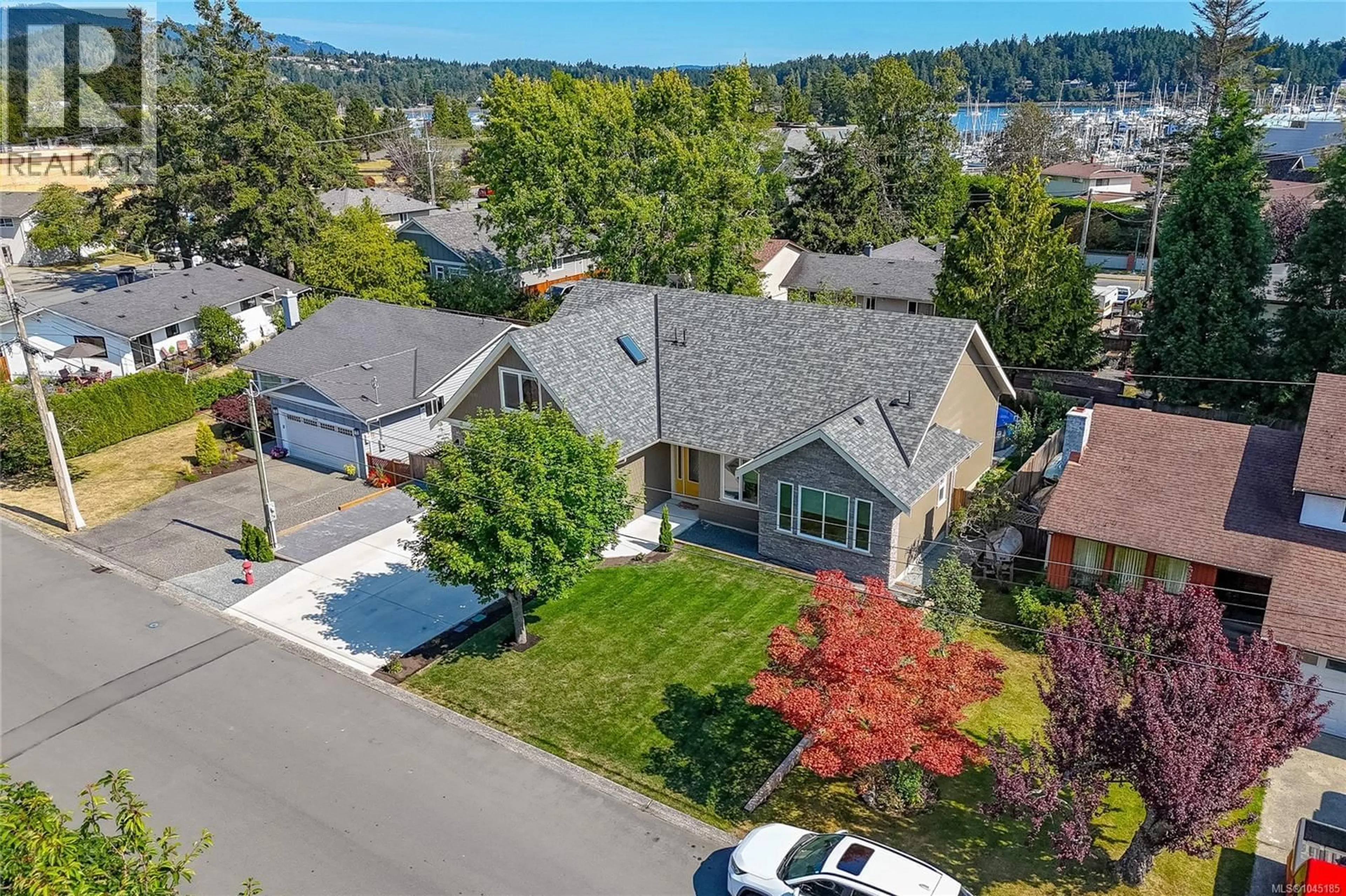 A pic from outside/outdoor area/front of a property/back of a property/a pic from drone, street for 2104 COLINWOOD ROAD, Sidney British Columbia V8L4H5