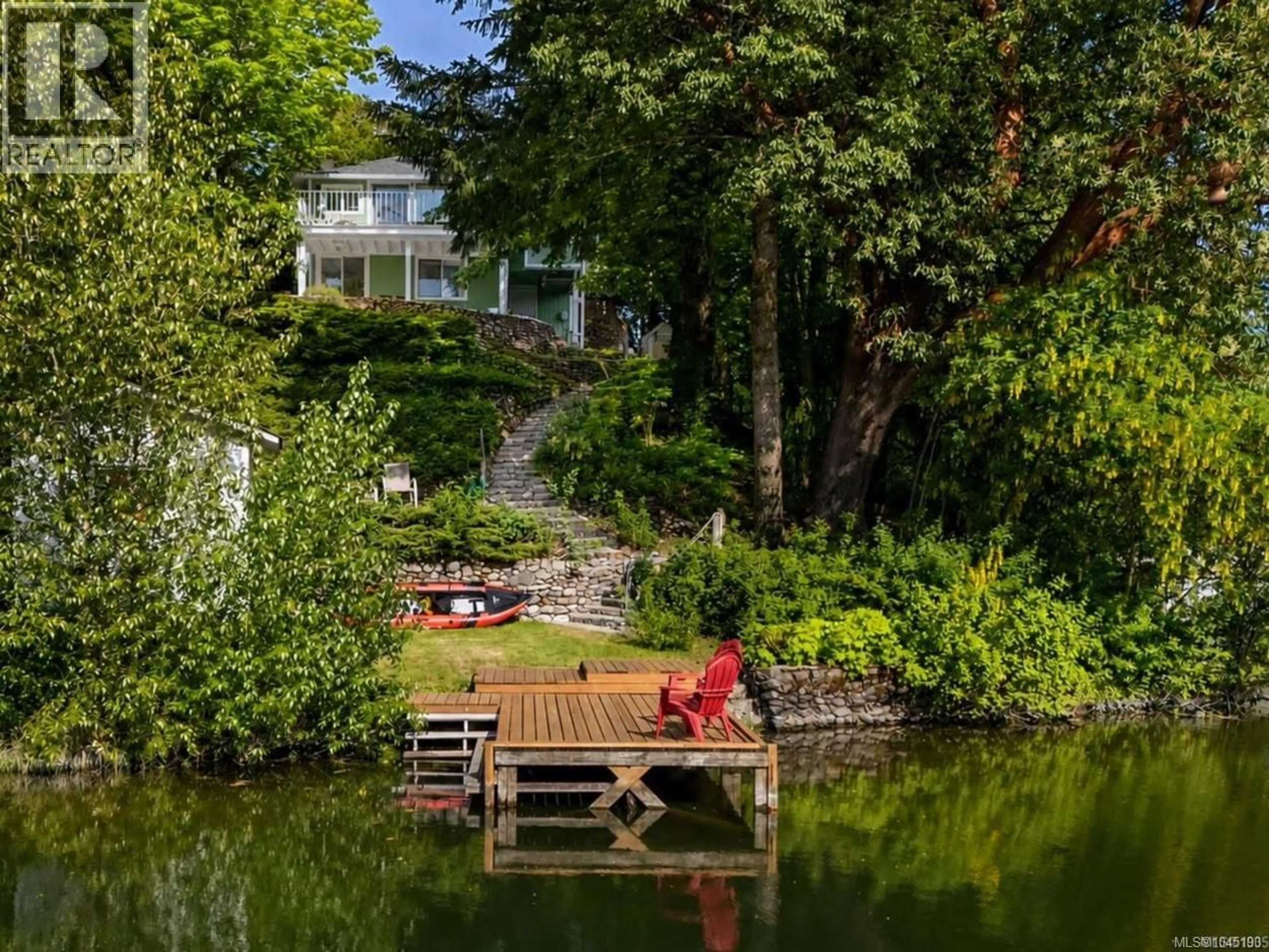 A pic from outside/outdoor area/front of a property/back of a property/a pic from drone, water/lake/river/ocean view for 1055 TRILLIUM ROAD, Langford British Columbia V9B4G3