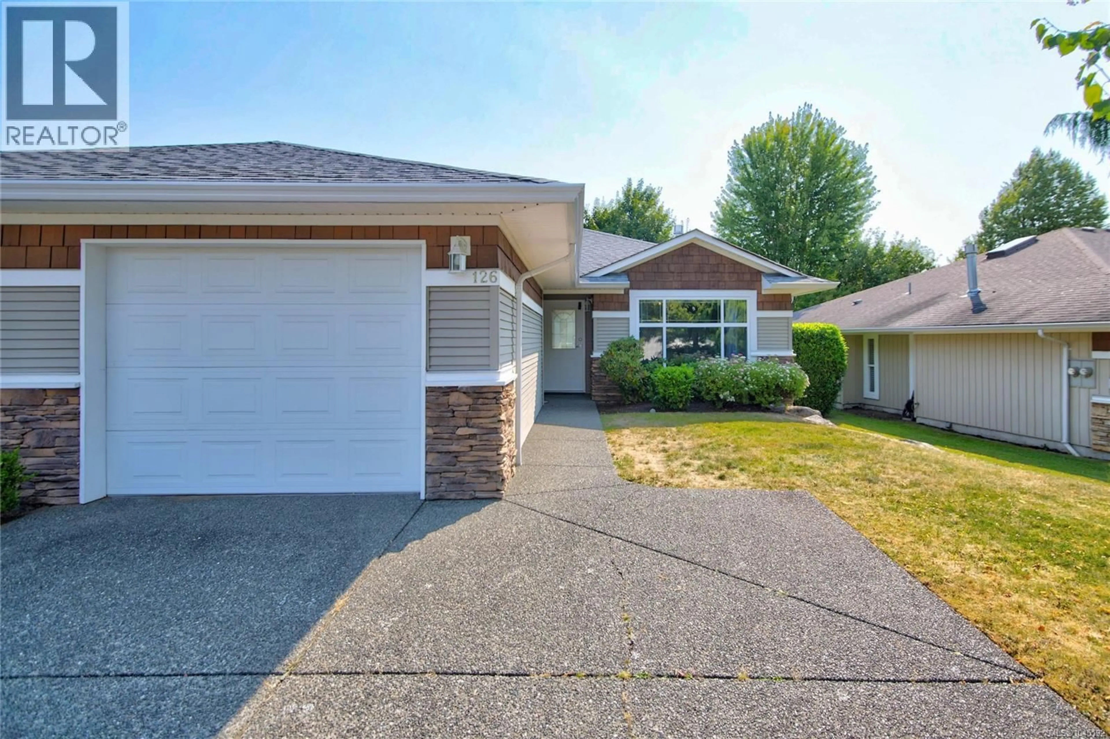 Home with vinyl exterior material, street for 126 - 2077 ST. ANDREWS WAY, Courtenay British Columbia V9N9V5