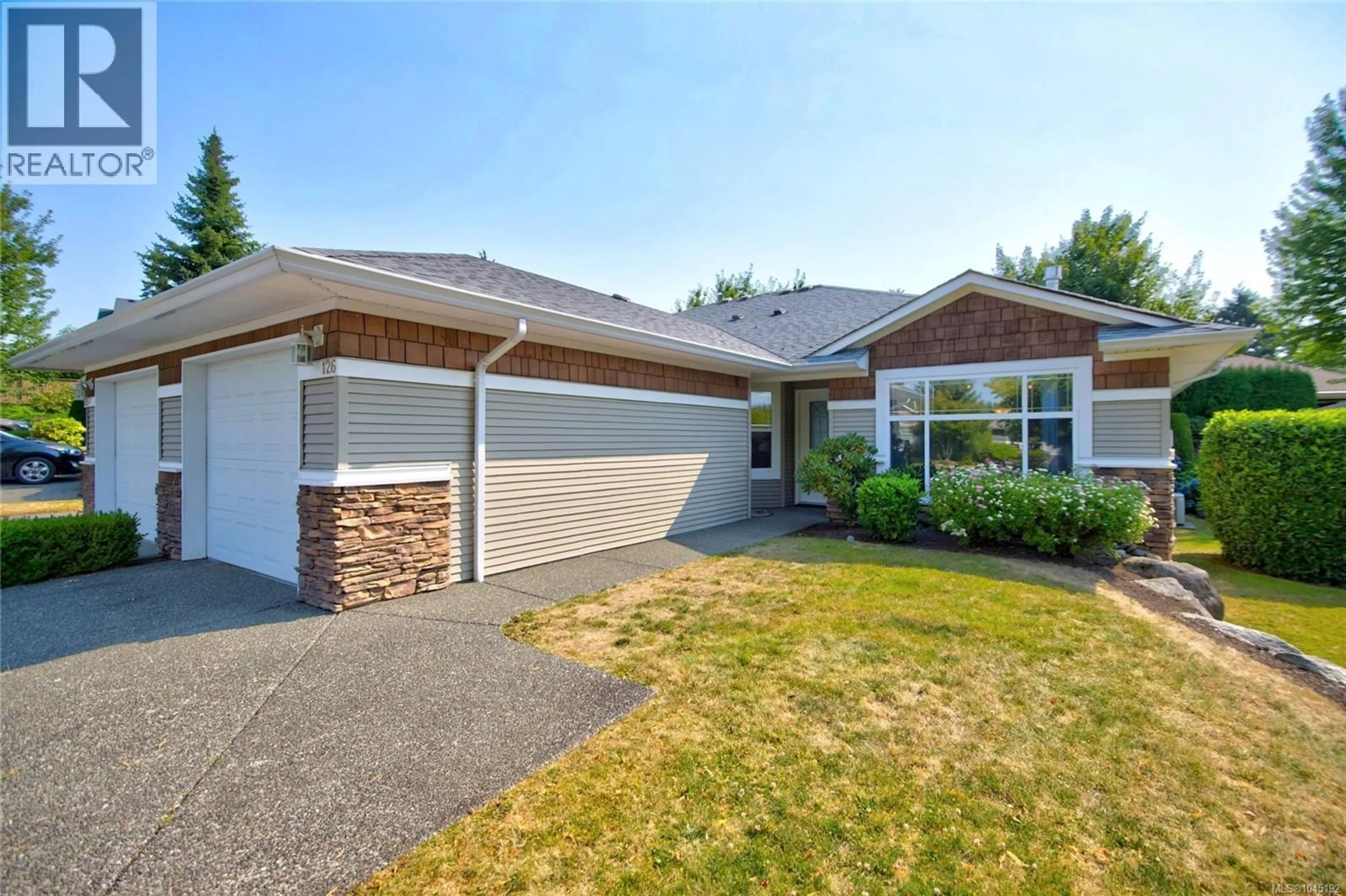 Home with vinyl exterior material, street for 126 - 2077 ST. ANDREWS WAY, Courtenay British Columbia V9N9V5