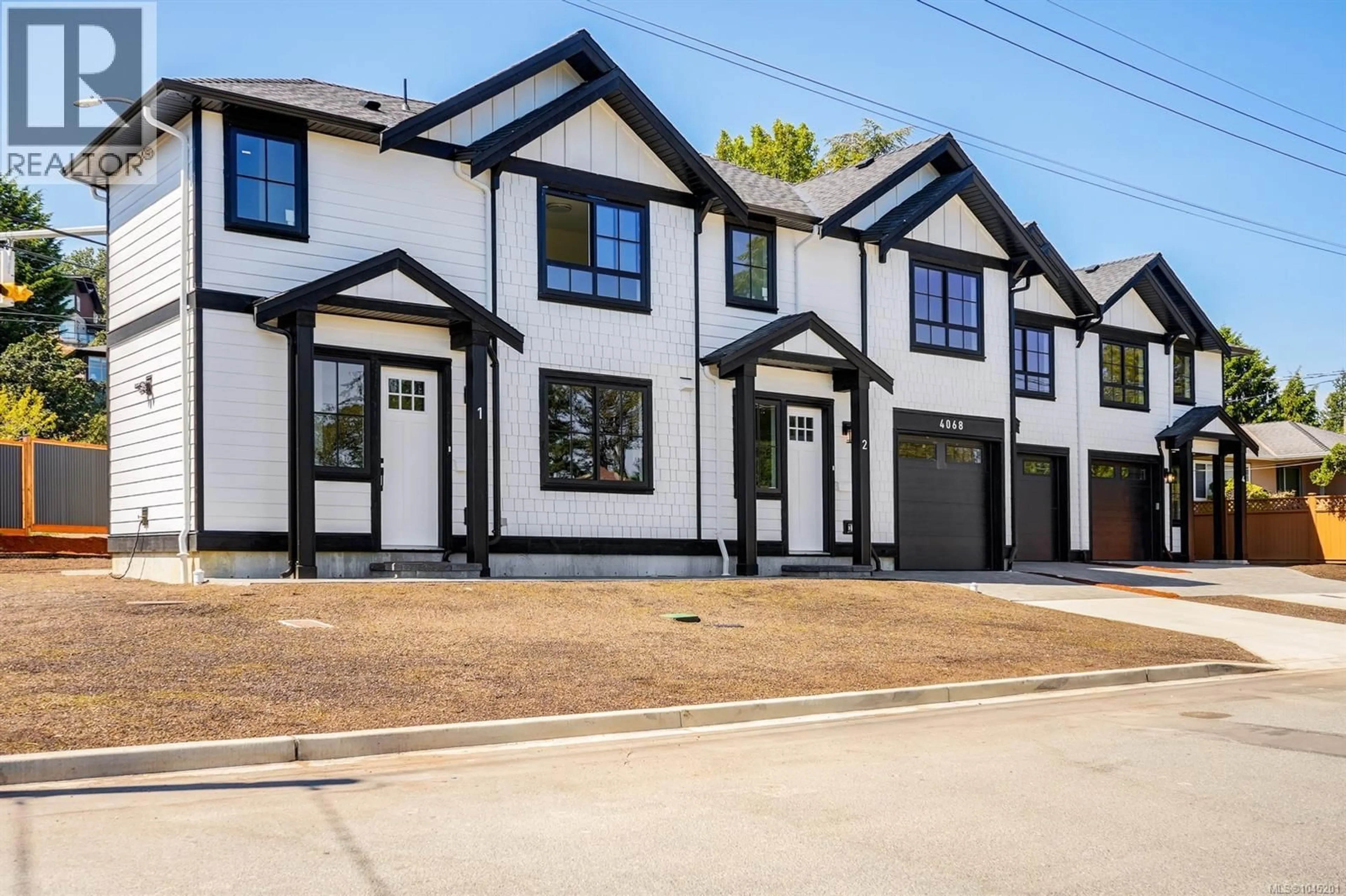 Home with brick exterior material, street for 1 - 4068 TUXEDO DRIVE, Saanich British Columbia V8X2L3