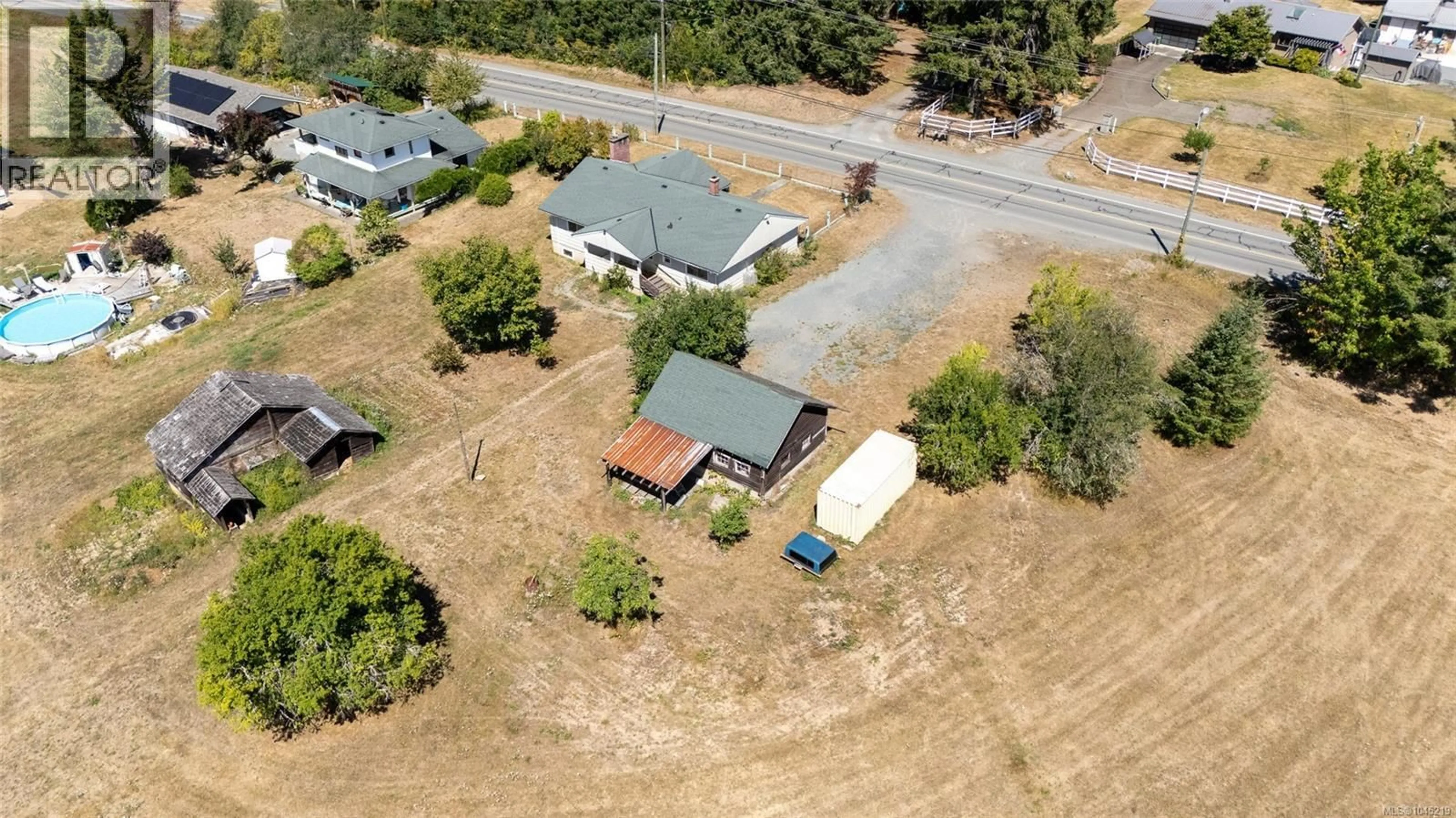 A pic from outside/outdoor area/front of a property/back of a property/a pic from drone, street for 4030 GIBBINS ROAD, Duncan British Columbia V9L1N9