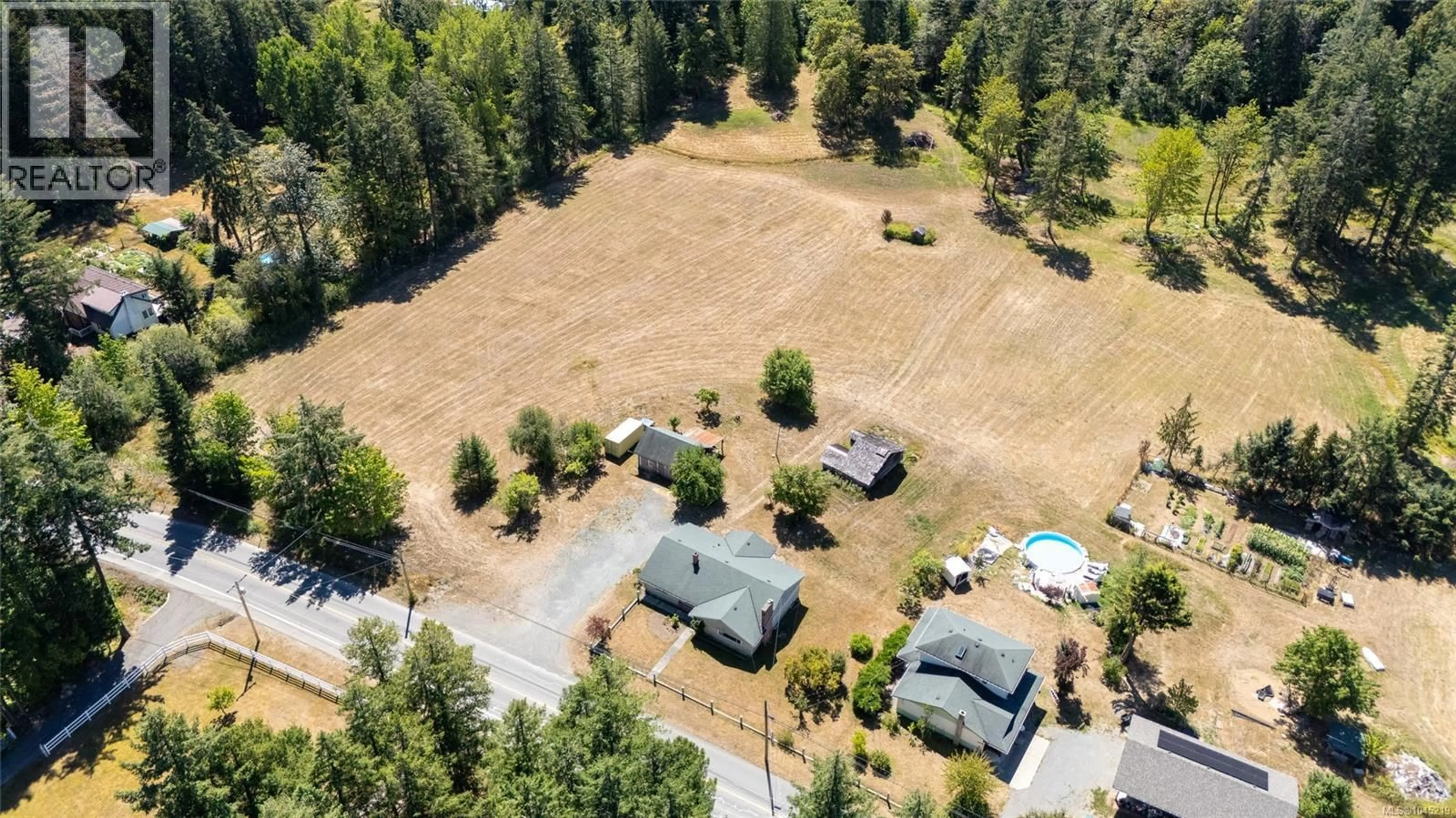 A pic from outside/outdoor area/front of a property/back of a property/a pic from drone, forest/trees view for 4030 GIBBINS ROAD, Duncan British Columbia V9L1N9