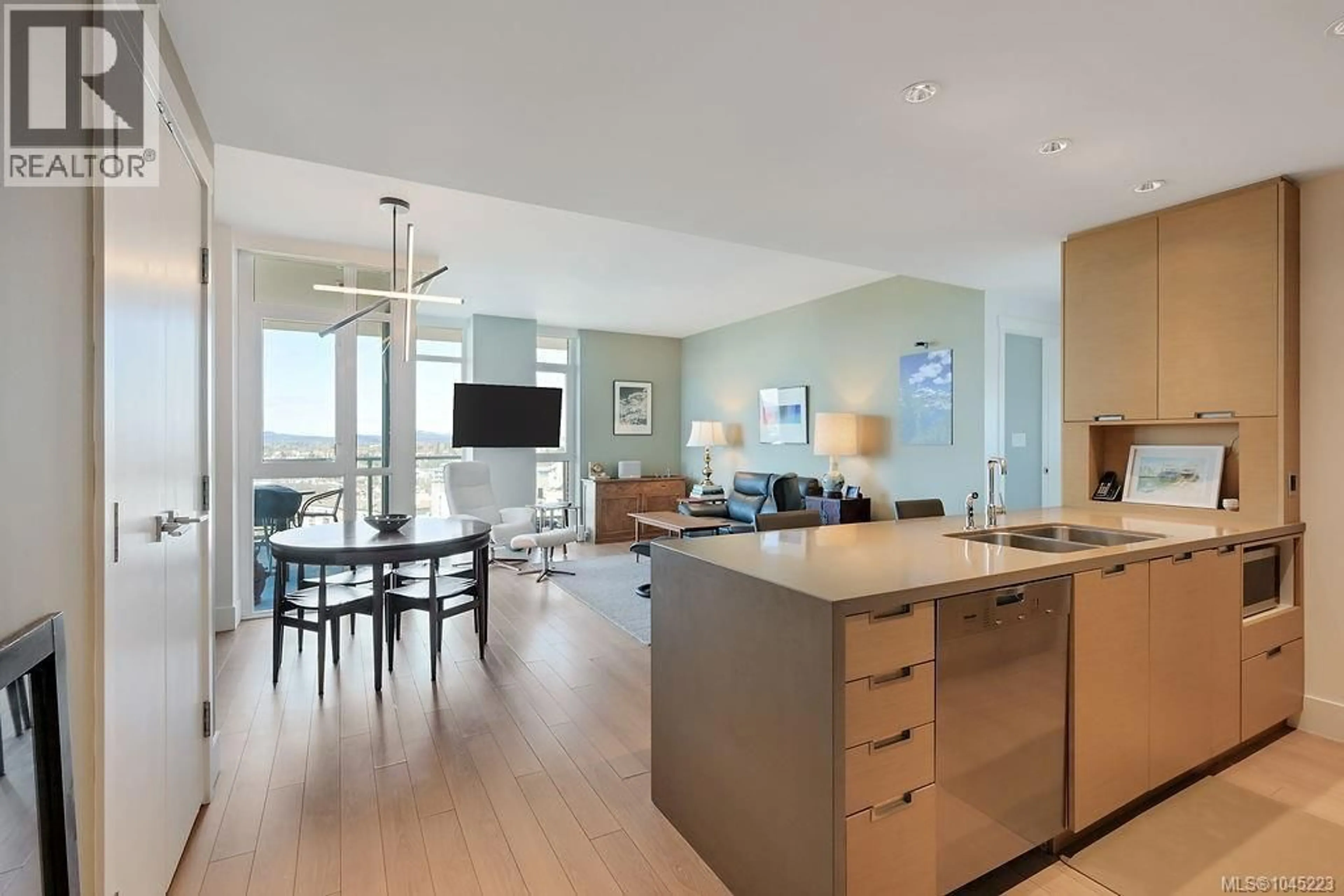 Open concept kitchen, wood/laminate floor for 1404 - 83 SAGHALIE ROAD, Victoria British Columbia V9A0E7