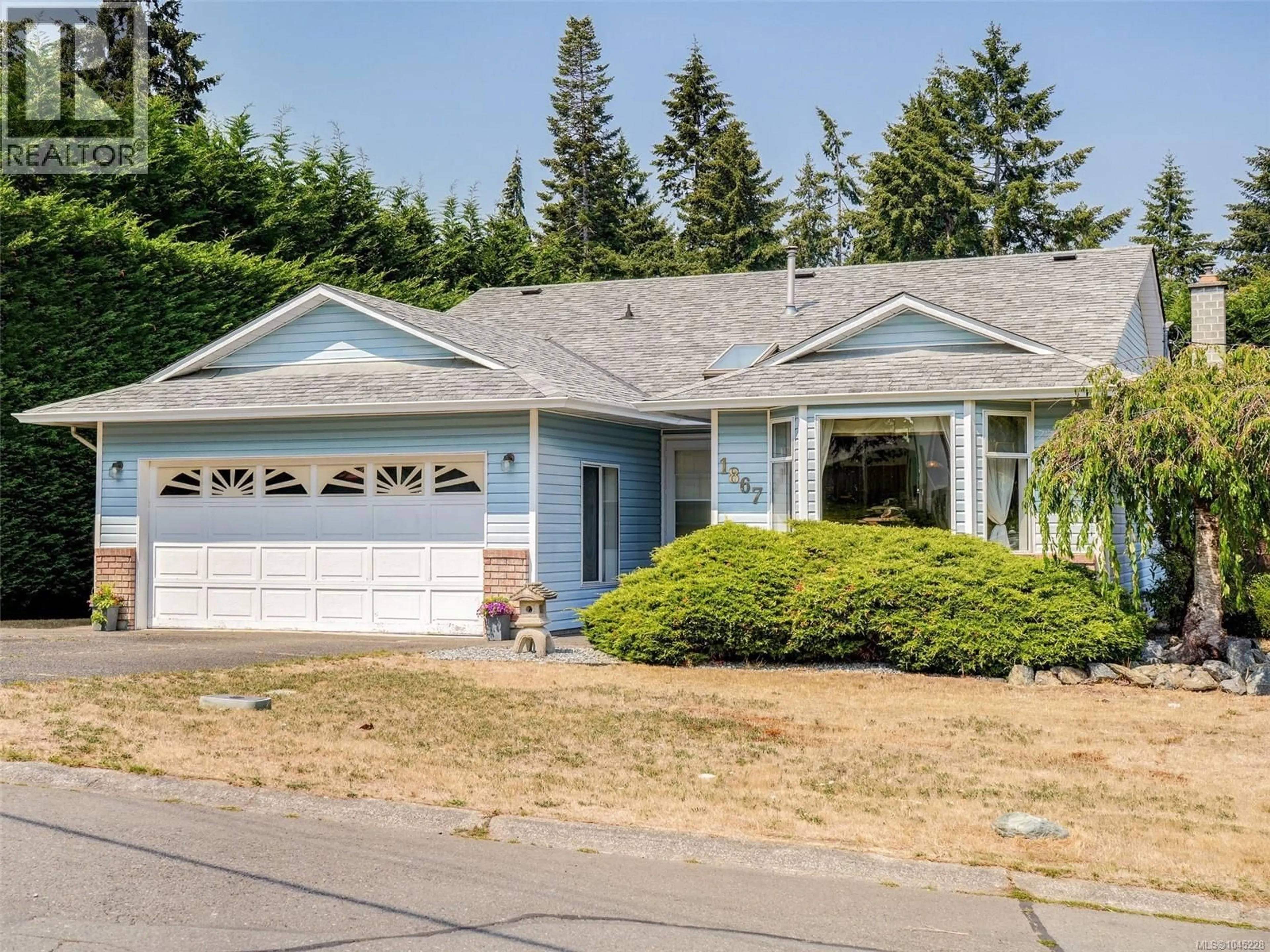 Home with vinyl exterior material, street for 1867 DEBORAH DRIVE, Duncan British Columbia V9L5A5