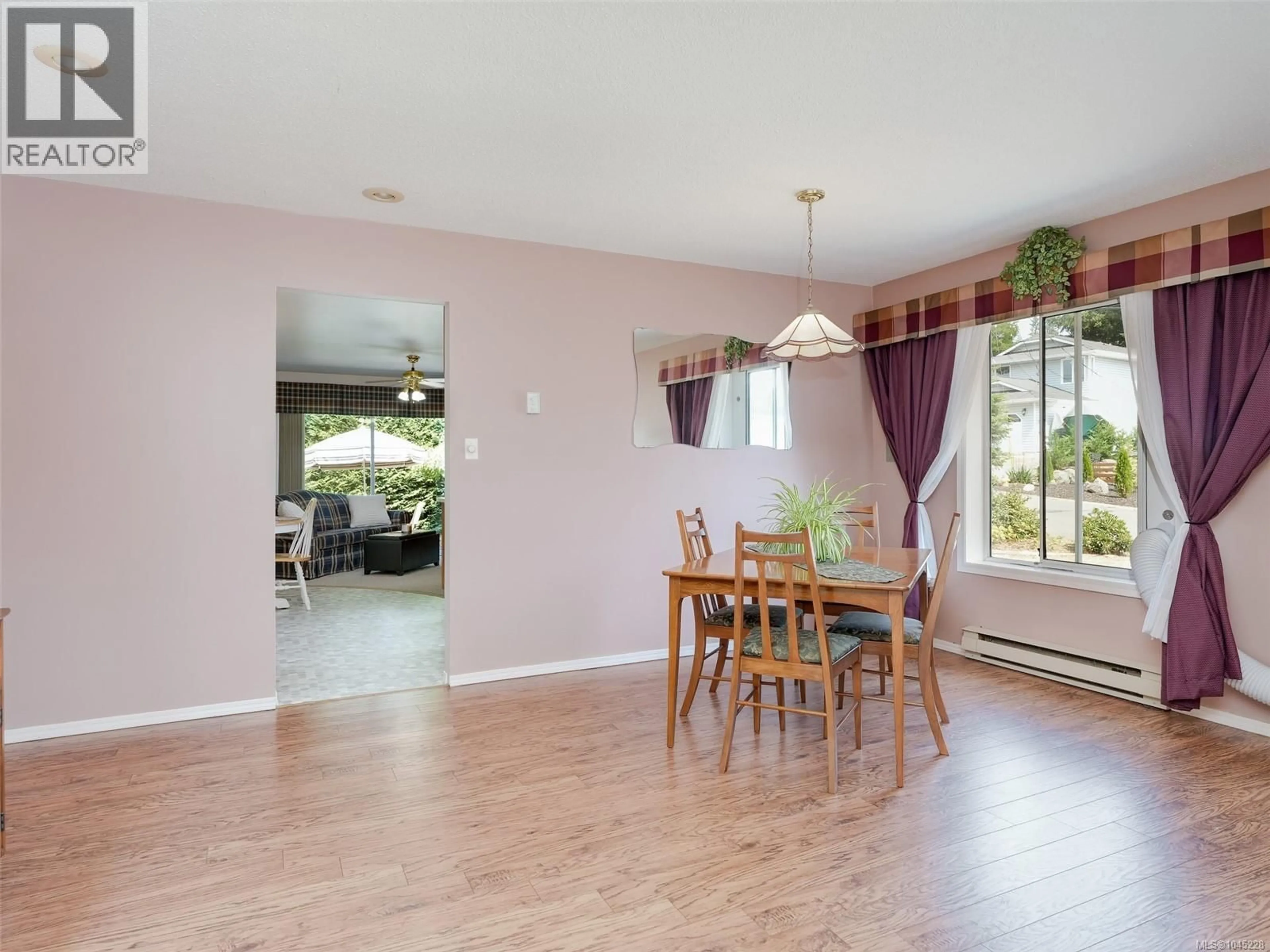Dining room, wood/laminate floor for 1867 DEBORAH DRIVE, Duncan British Columbia V9L5A5