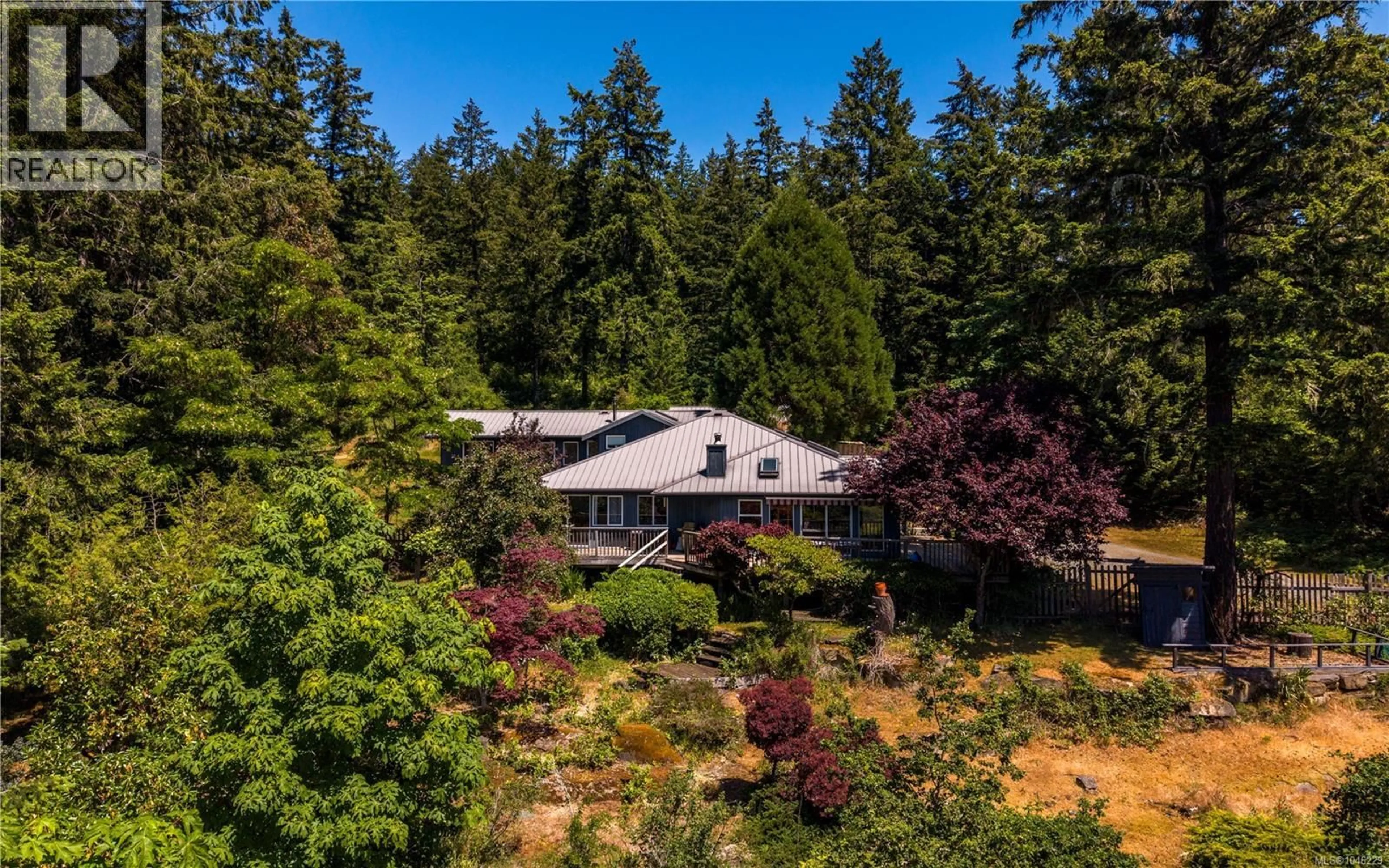 A pic from outside/outdoor area/front of a property/back of a property/a pic from drone, forest/trees view for 148 OAKSPRING ROAD, Salt Spring British Columbia V8K1S8