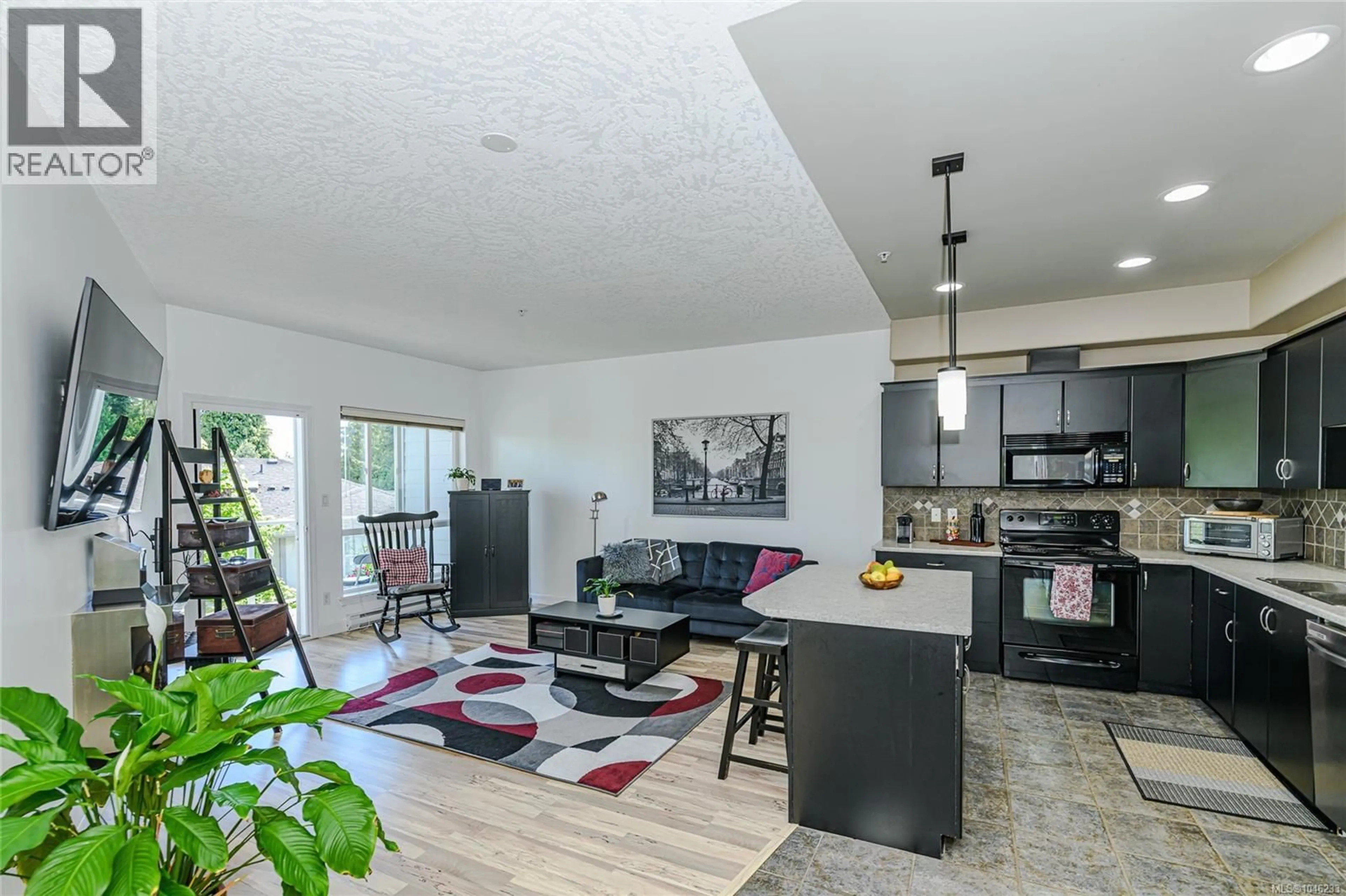 Open concept kitchen, unknown for 205 - 3915 CAREY ROAD, Saanich British Columbia V8Z1Z6