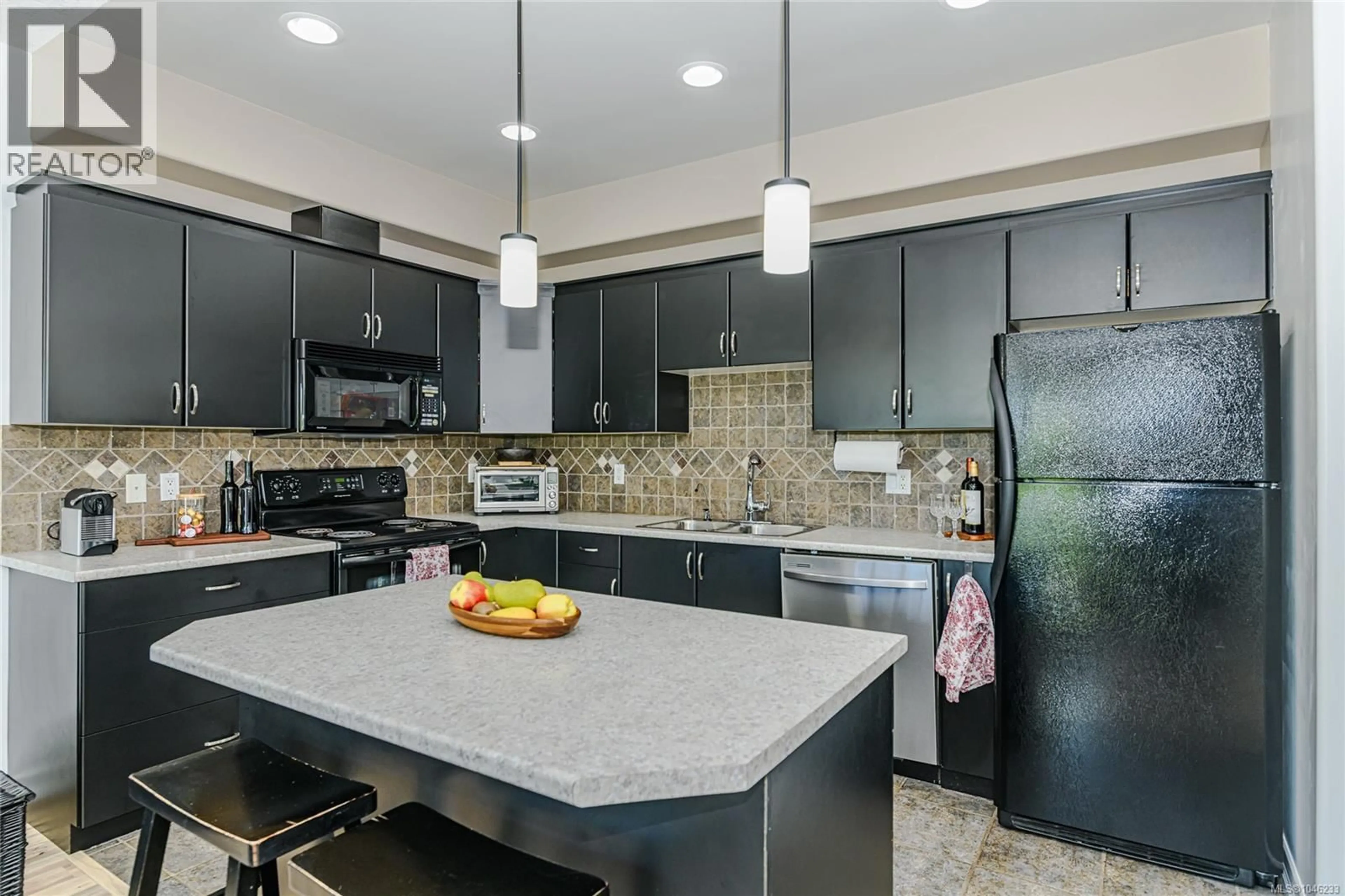 Contemporary kitchen, ceramic/tile floor for 205 - 3915 CAREY ROAD, Saanich British Columbia V8Z1Z6