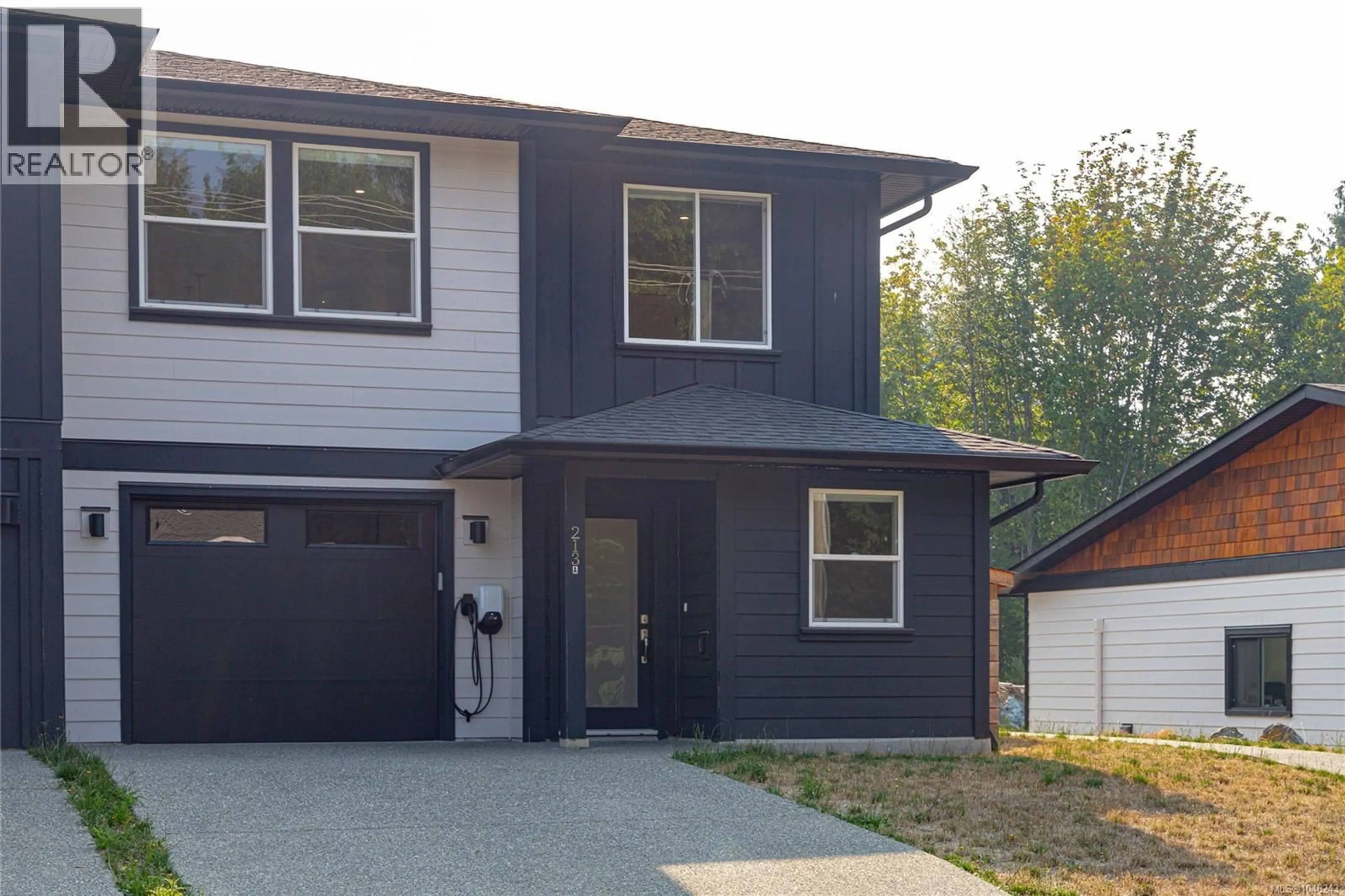 Home with vinyl exterior material, street for 213 MACDONALD ROAD, Lake Cowichan British Columbia V0R2G0