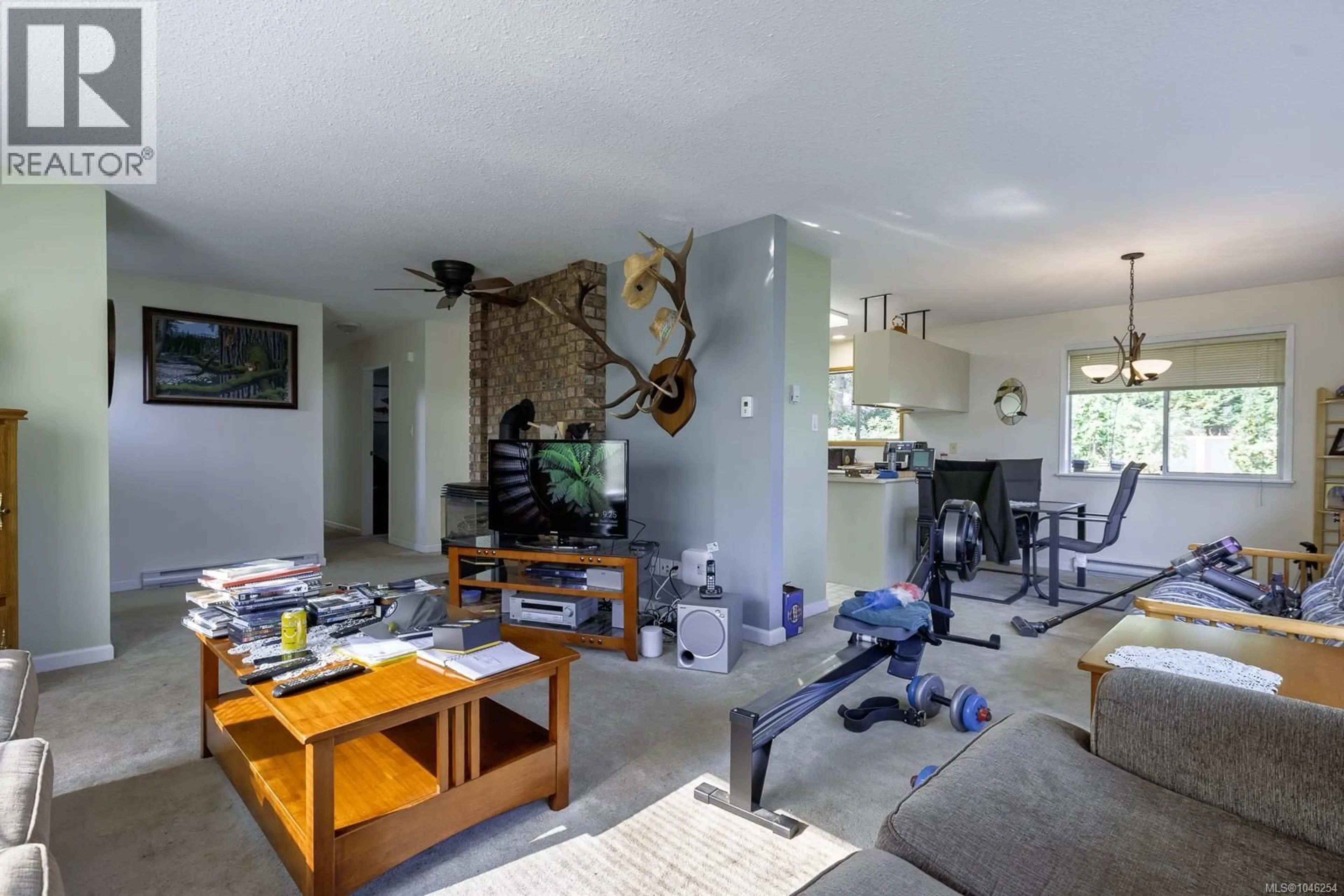 Living room with furniture, unknown for 6789 PHILIP ROAD, Lantzville British Columbia V0R2H0