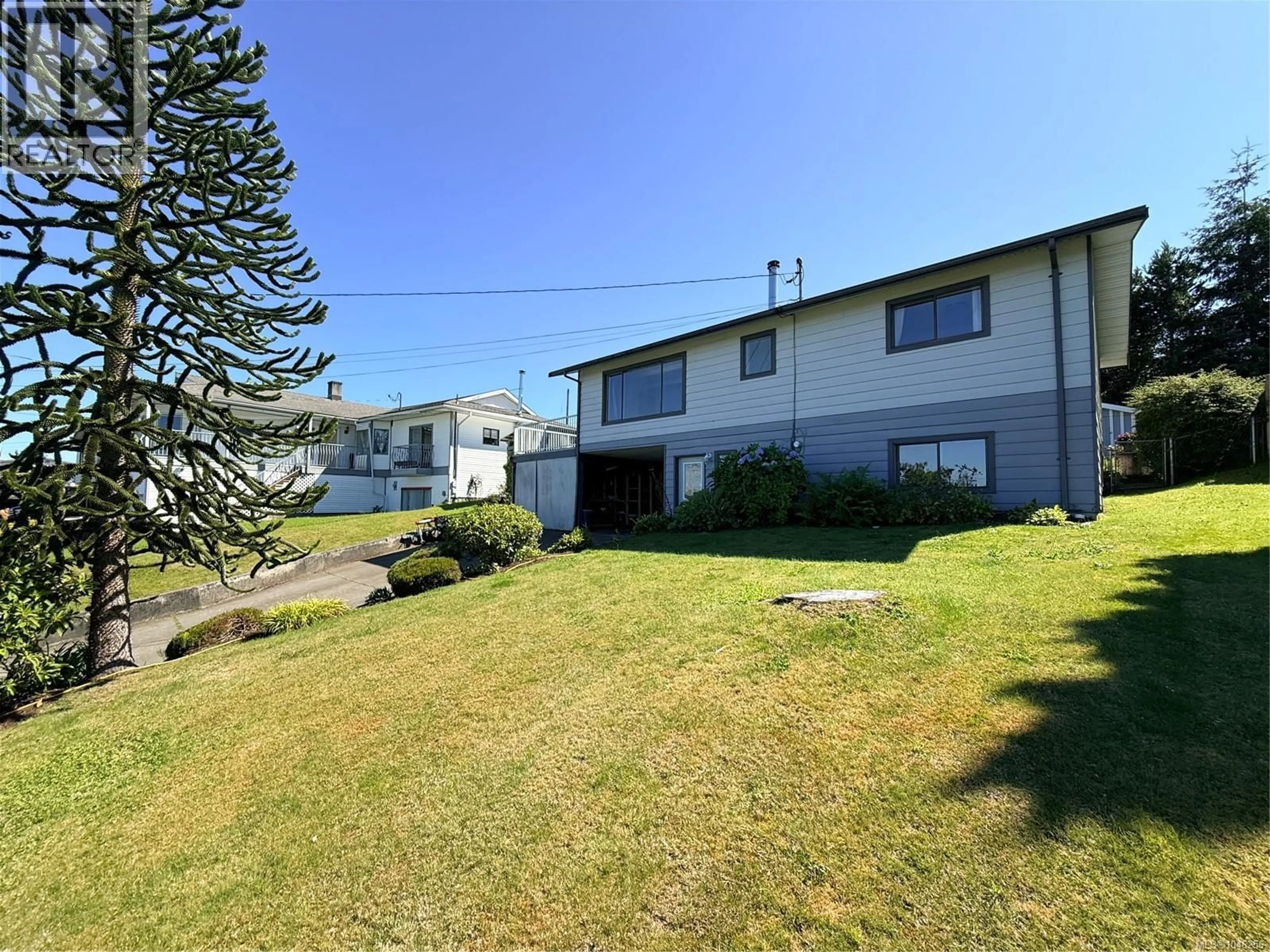 A pic from outside/outdoor area/front of a property/back of a property/a pic from drone, unknown for 2273 CHELOHSIN CRESCENT, Port McNeill British Columbia V0N2R0