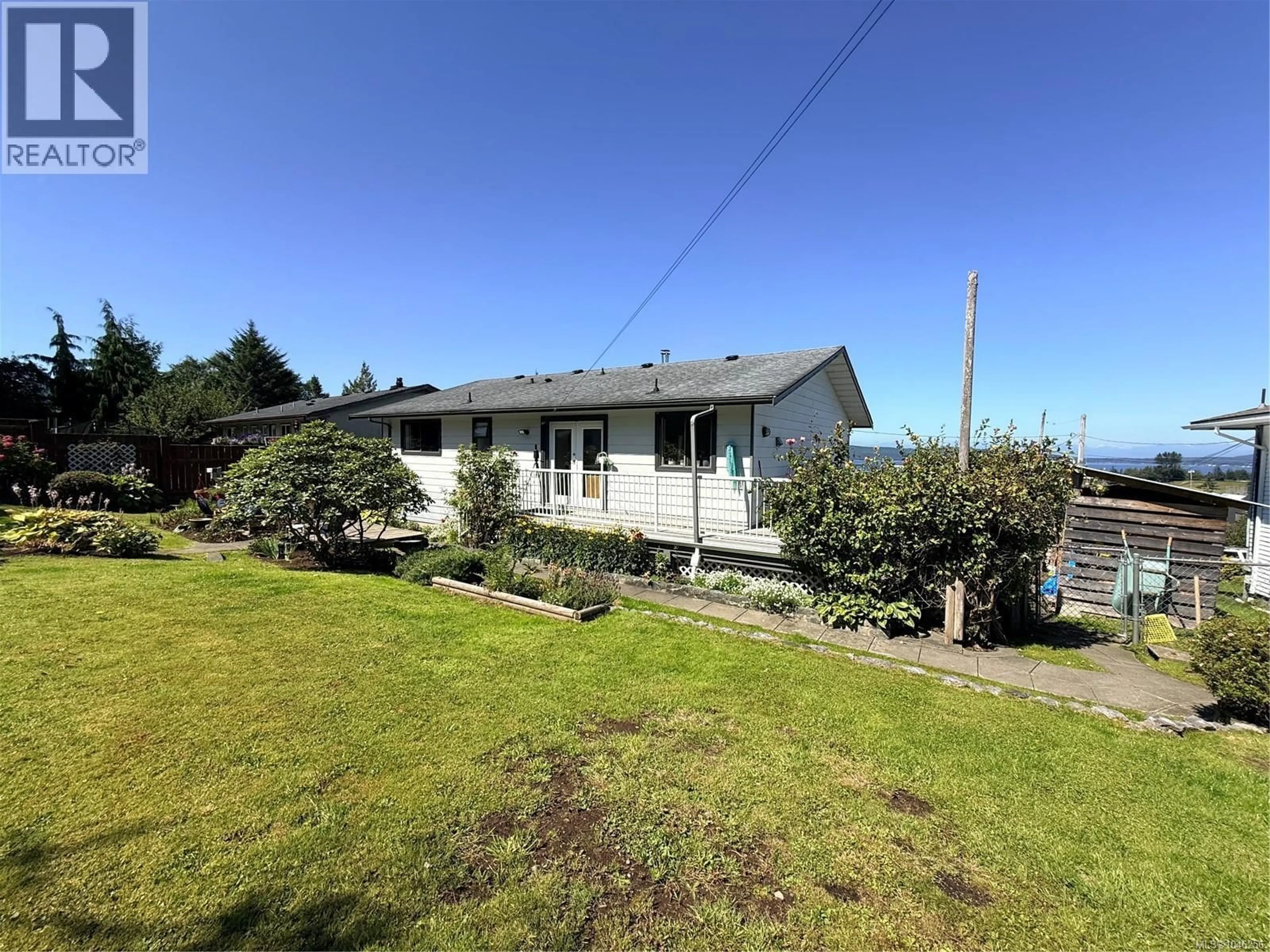 A pic from outside/outdoor area/front of a property/back of a property/a pic from drone, street for 2273 CHELOHSIN CRESCENT, Port McNeill British Columbia V0N2R0