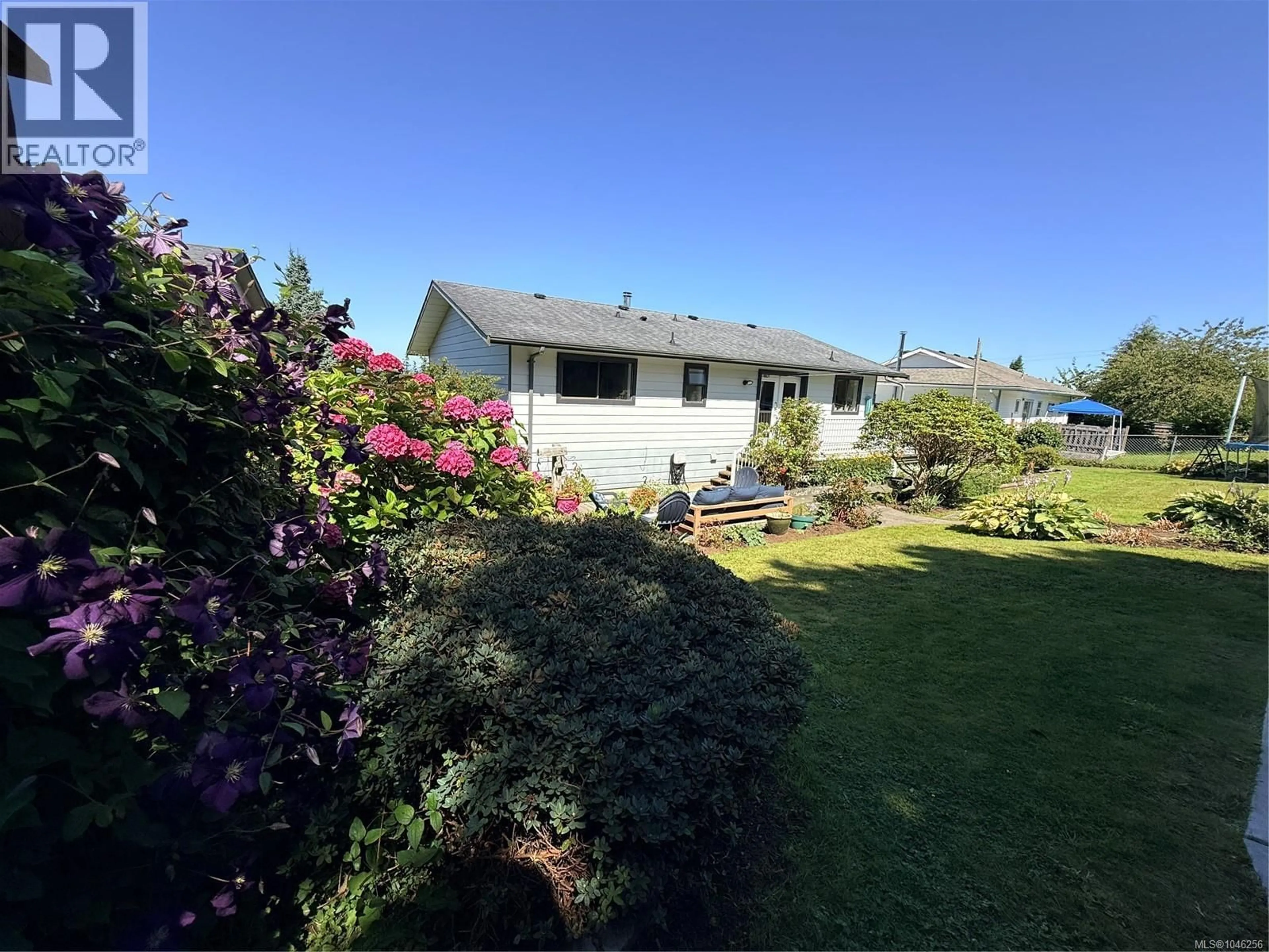 A pic from outside/outdoor area/front of a property/back of a property/a pic from drone, unknown for 2273 CHELOHSIN CRESCENT, Port McNeill British Columbia V0N2R0