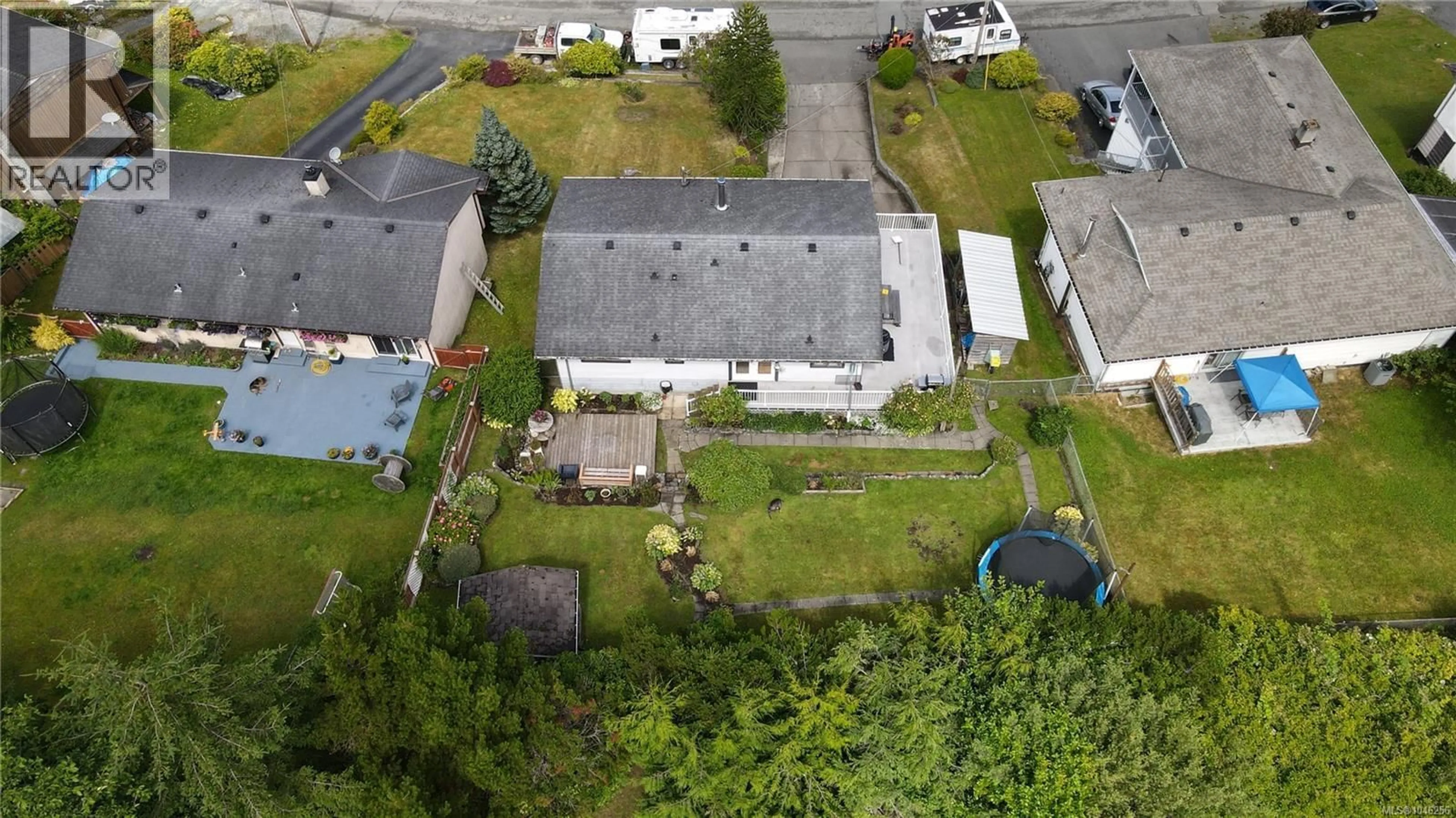 A pic from outside/outdoor area/front of a property/back of a property/a pic from drone, street for 2273 CHELOHSIN CRESCENT, Port McNeill British Columbia V0N2R0