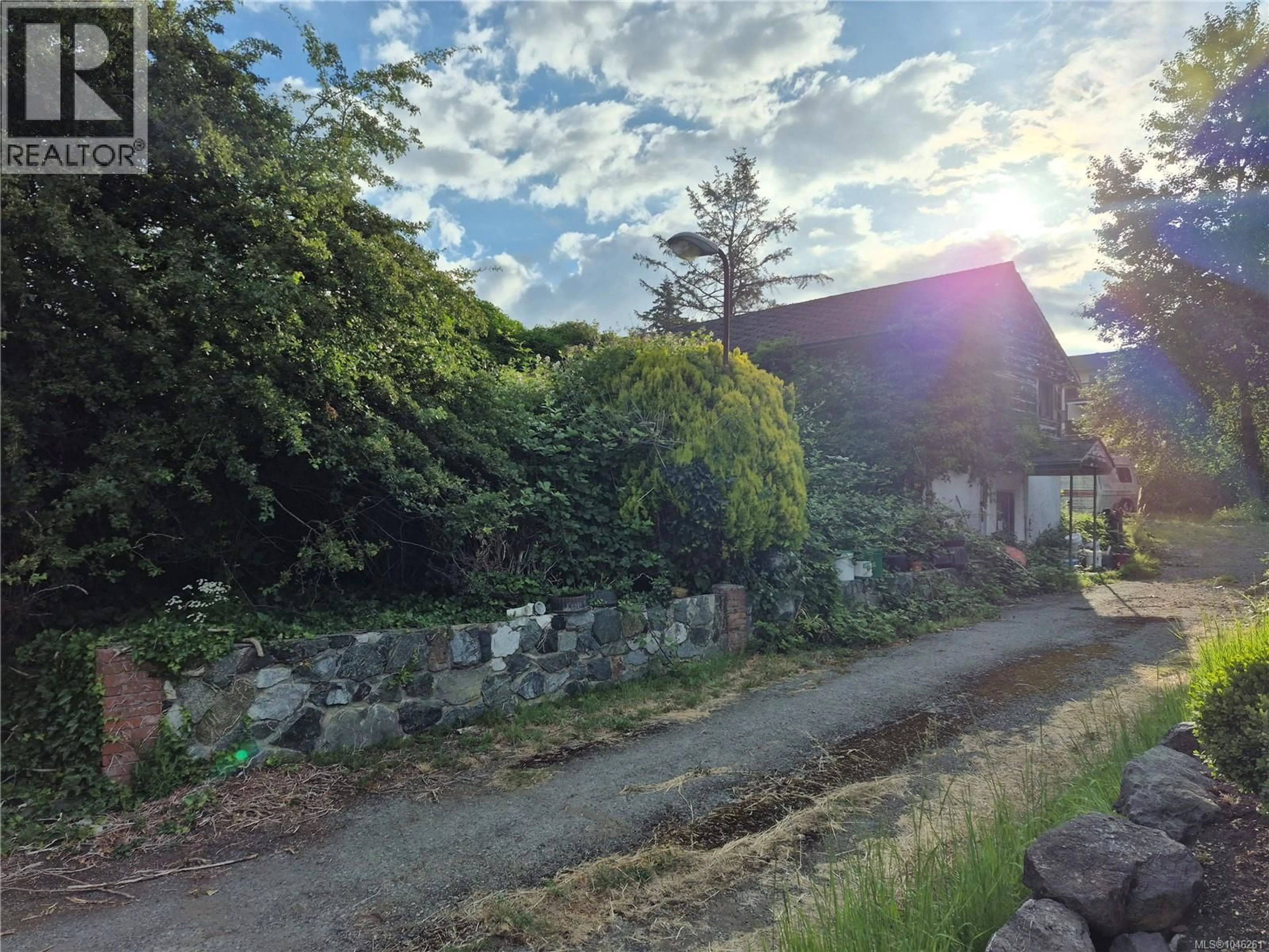 A pic from outside/outdoor area/front of a property/back of a property/a pic from drone, street for 4129 GILLIE ROAD, Saanich British Columbia V9E2C7