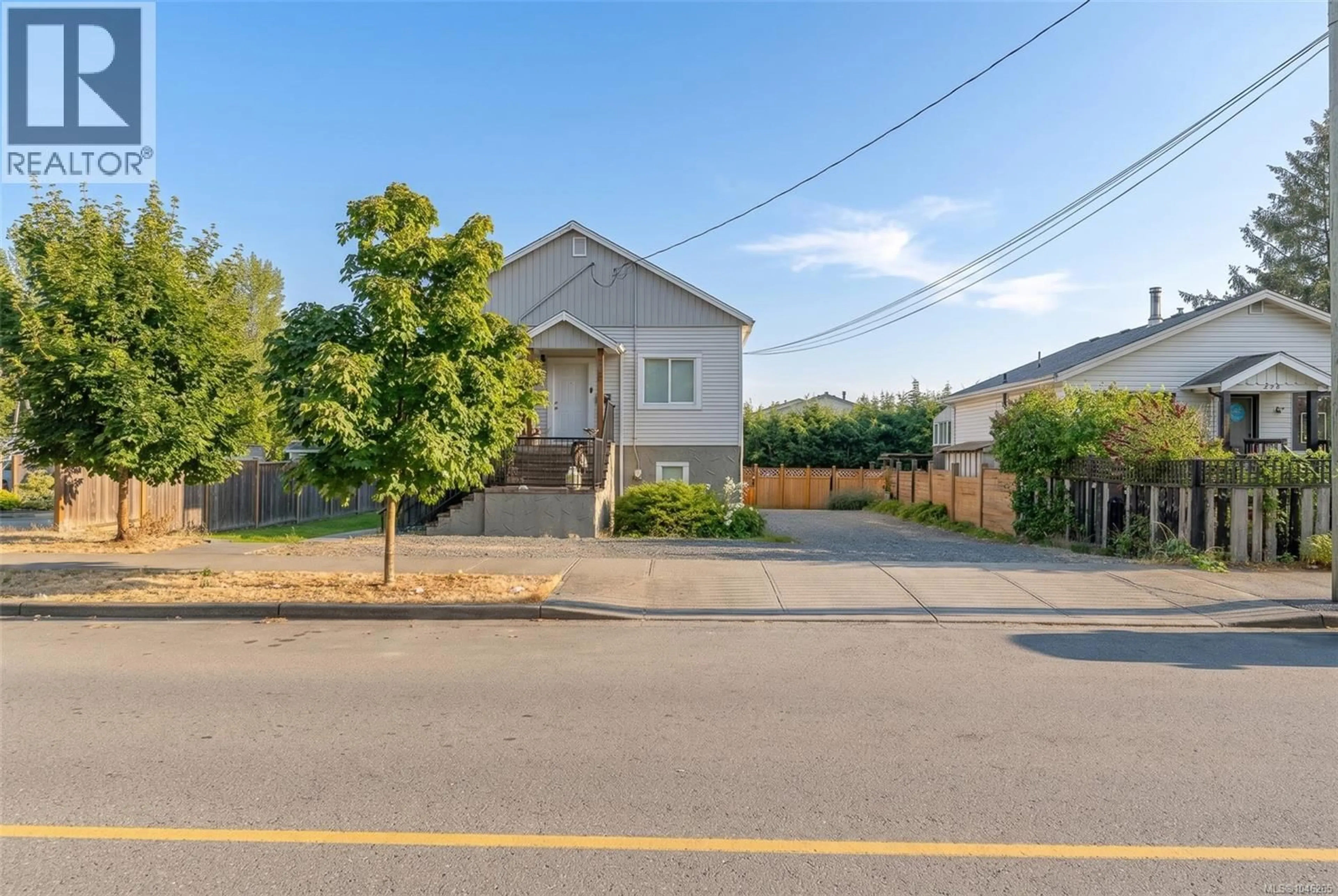 A pic from outside/outdoor area/front of a property/back of a property/a pic from drone, street for 121 HAREWOOD ROAD, Nanaimo British Columbia V9R2Y7