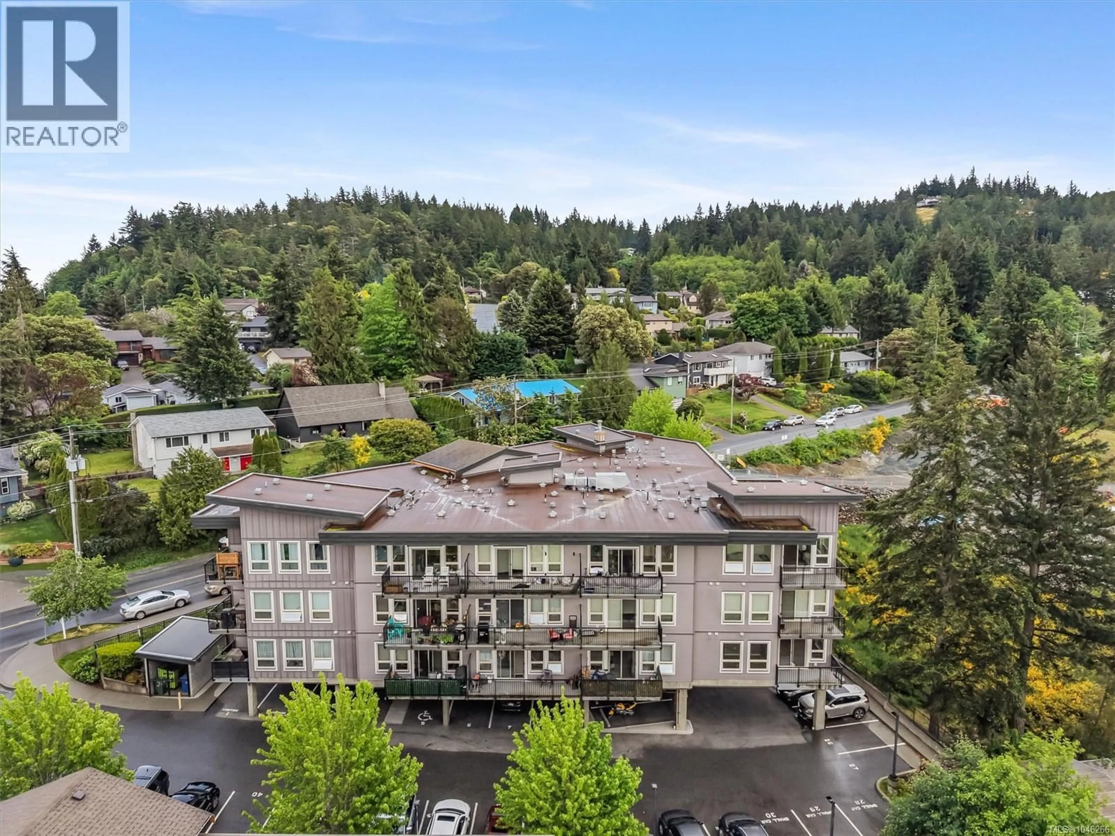 A pic from outside/outdoor area/front of a property/back of a property/a pic from drone, mountain view for 410 - 3240 JACKLIN ROAD, Langford British Columbia V9B0J5