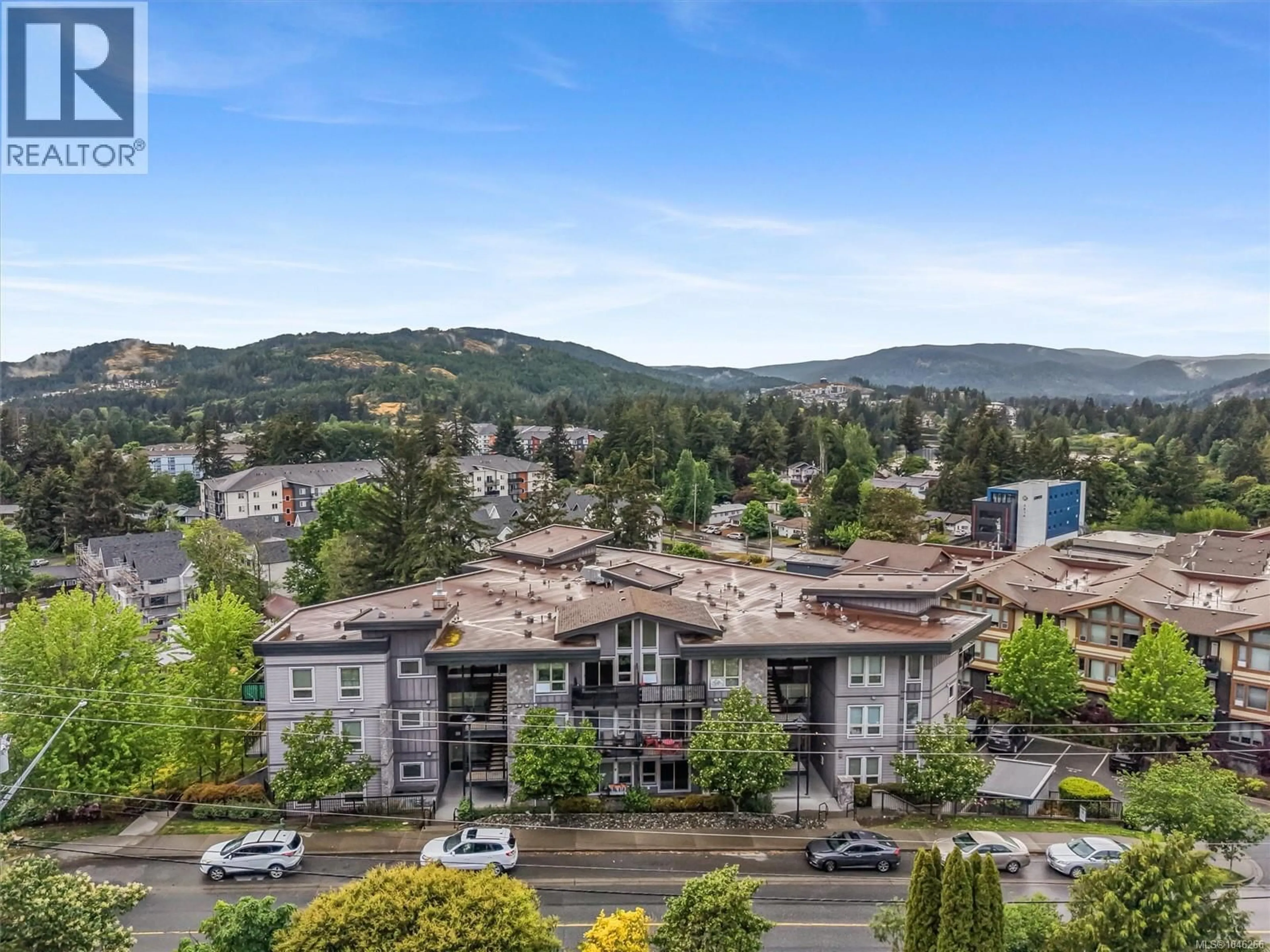 A pic from outside/outdoor area/front of a property/back of a property/a pic from drone, mountain view for 410 - 3240 JACKLIN ROAD, Langford British Columbia V9B0J5