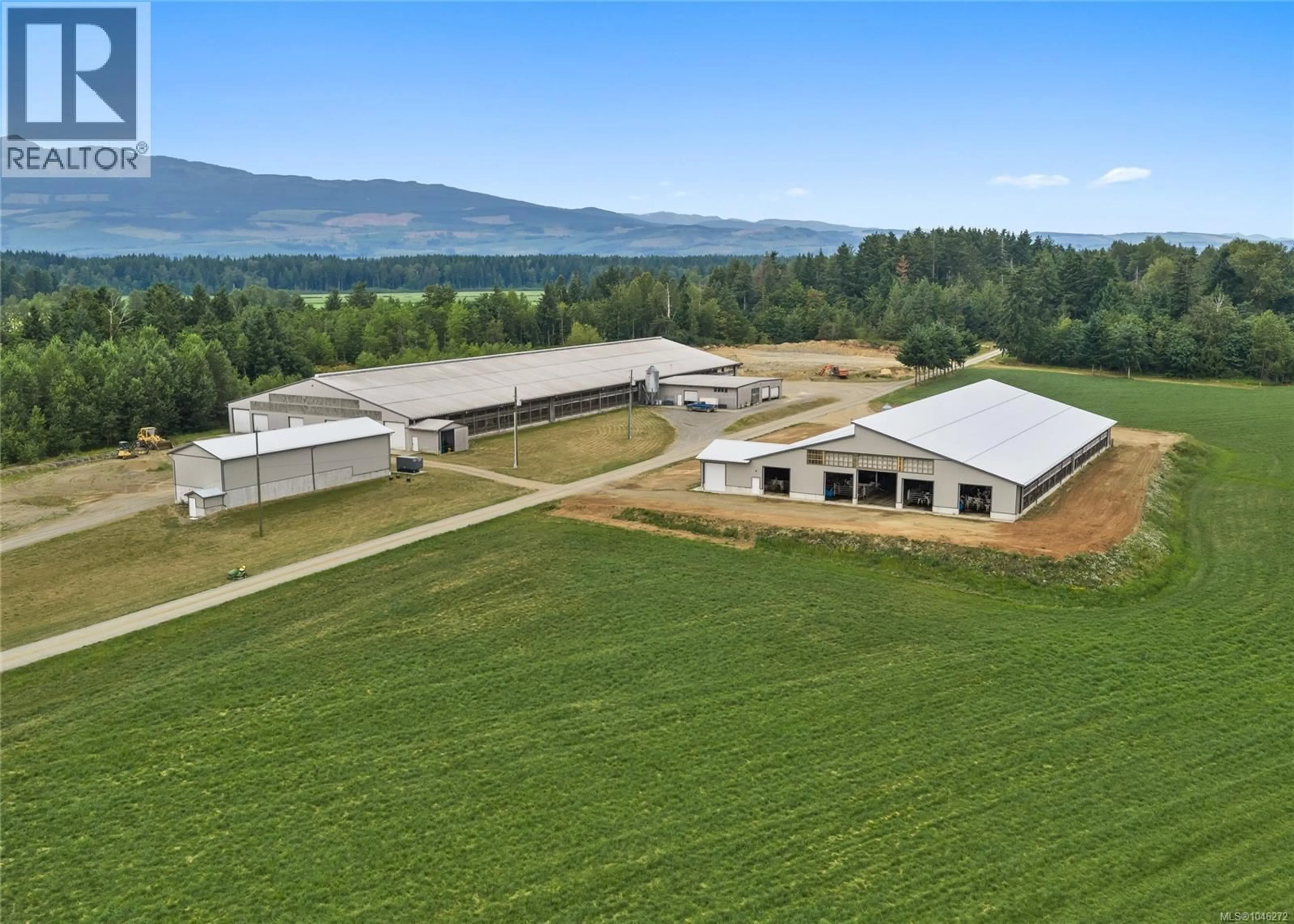 A pic from outside/outdoor area/front of a property/back of a property/a pic from drone, mountain view for 2400 PLOYART ROAD, Black Creek British Columbia V9J1H8