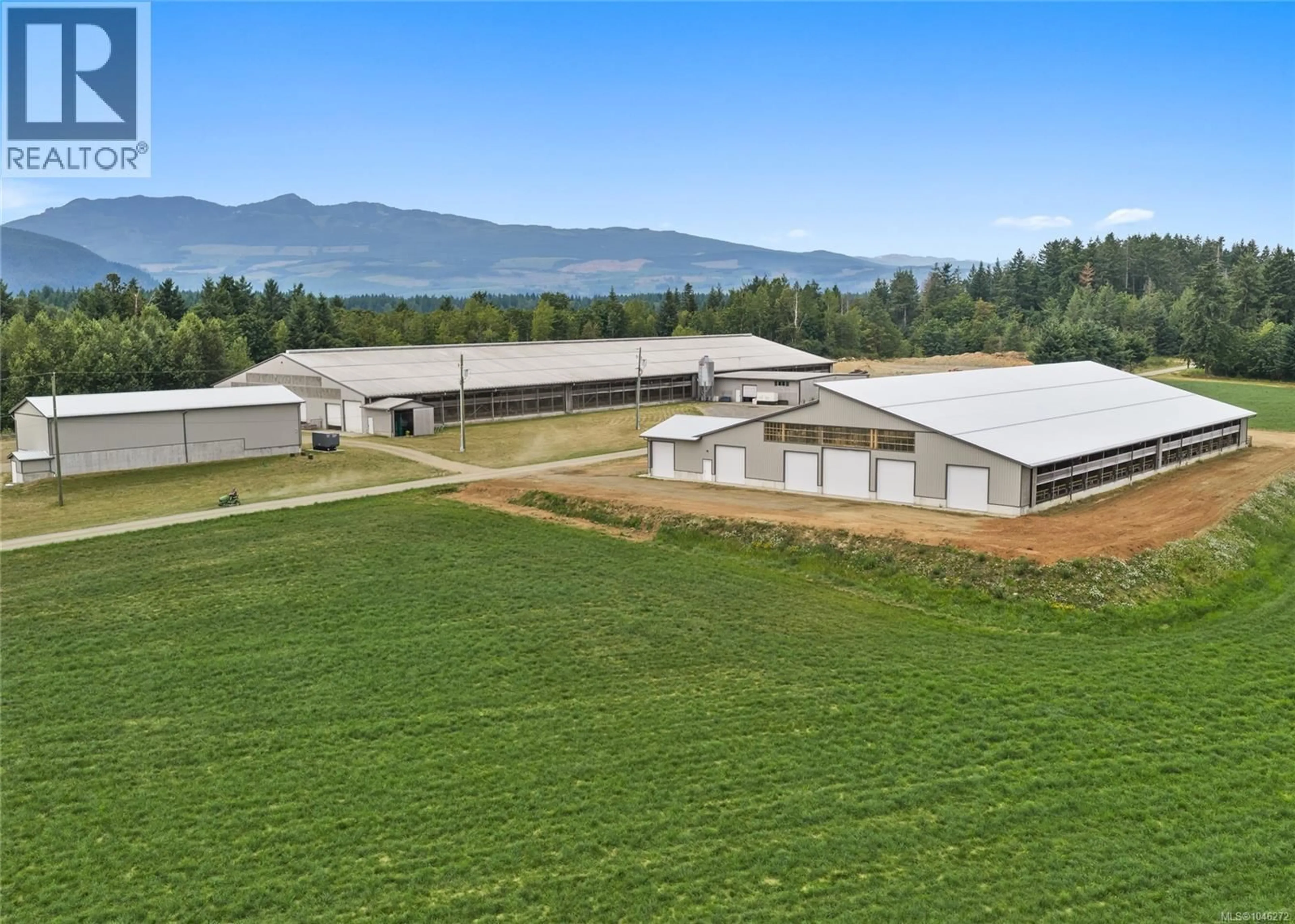 A pic from outside/outdoor area/front of a property/back of a property/a pic from drone, mountain view for 2400 PLOYART ROAD, Black Creek British Columbia V9J1H8