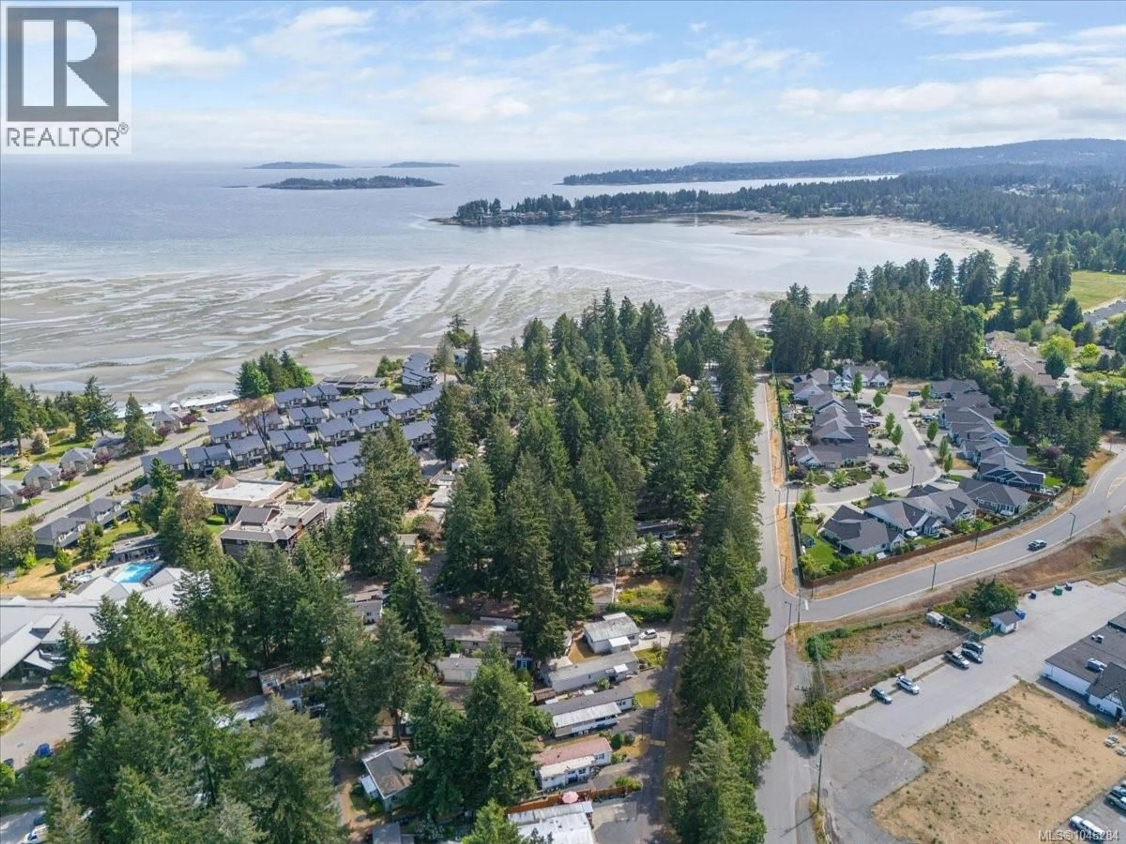 A pic from outside/outdoor area/front of a property/back of a property/a pic from drone, water/lake/river/ocean view for 53 - 1247 ARBUTUS ROAD, Parksville British Columbia V9P1R3