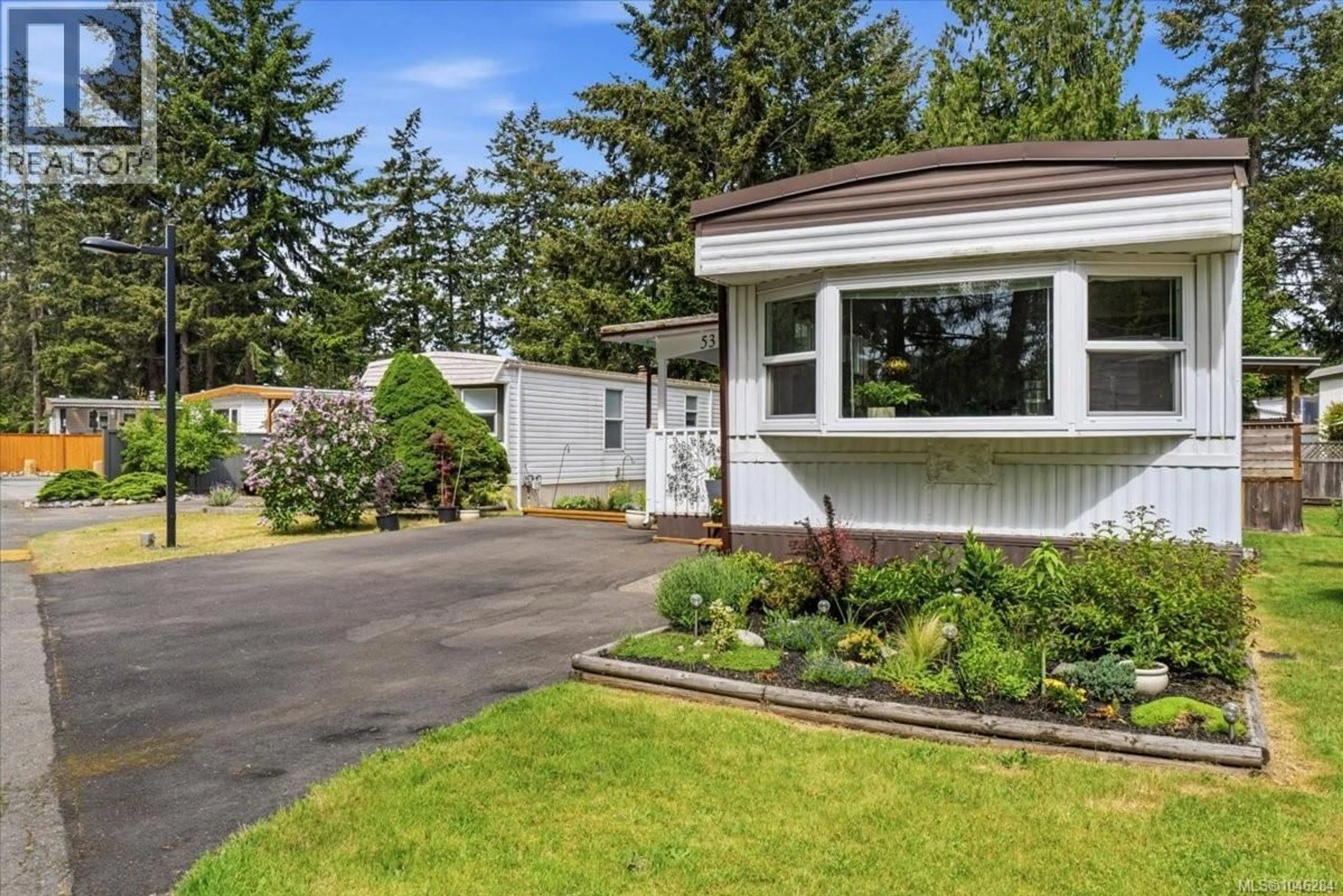 Home with vinyl exterior material, street for 53 - 1247 ARBUTUS ROAD, Parksville British Columbia V9P1R3