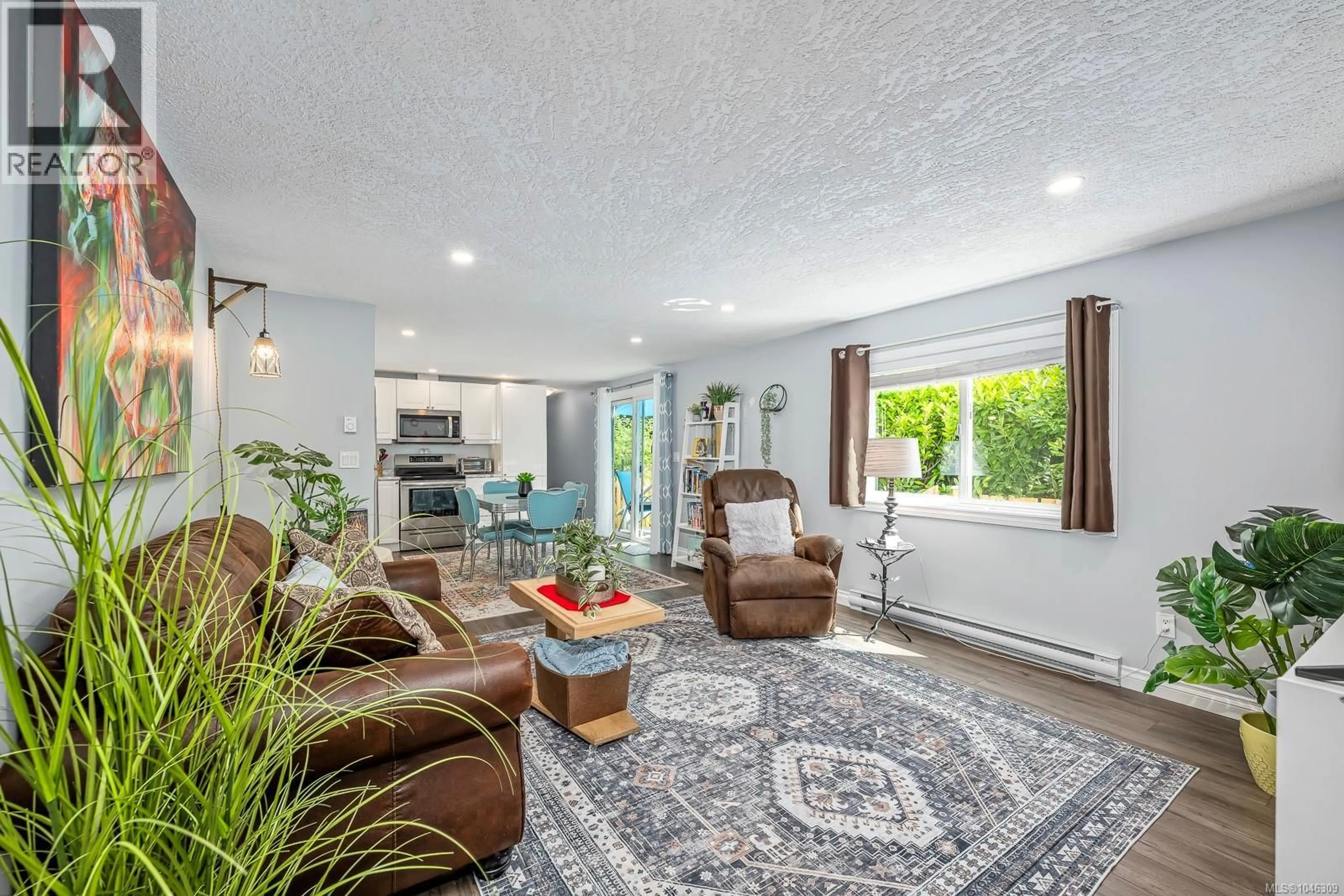 Living room with furniture, unknown for 2140 STADACONA DRIVE, Comox British Columbia V9M3P7