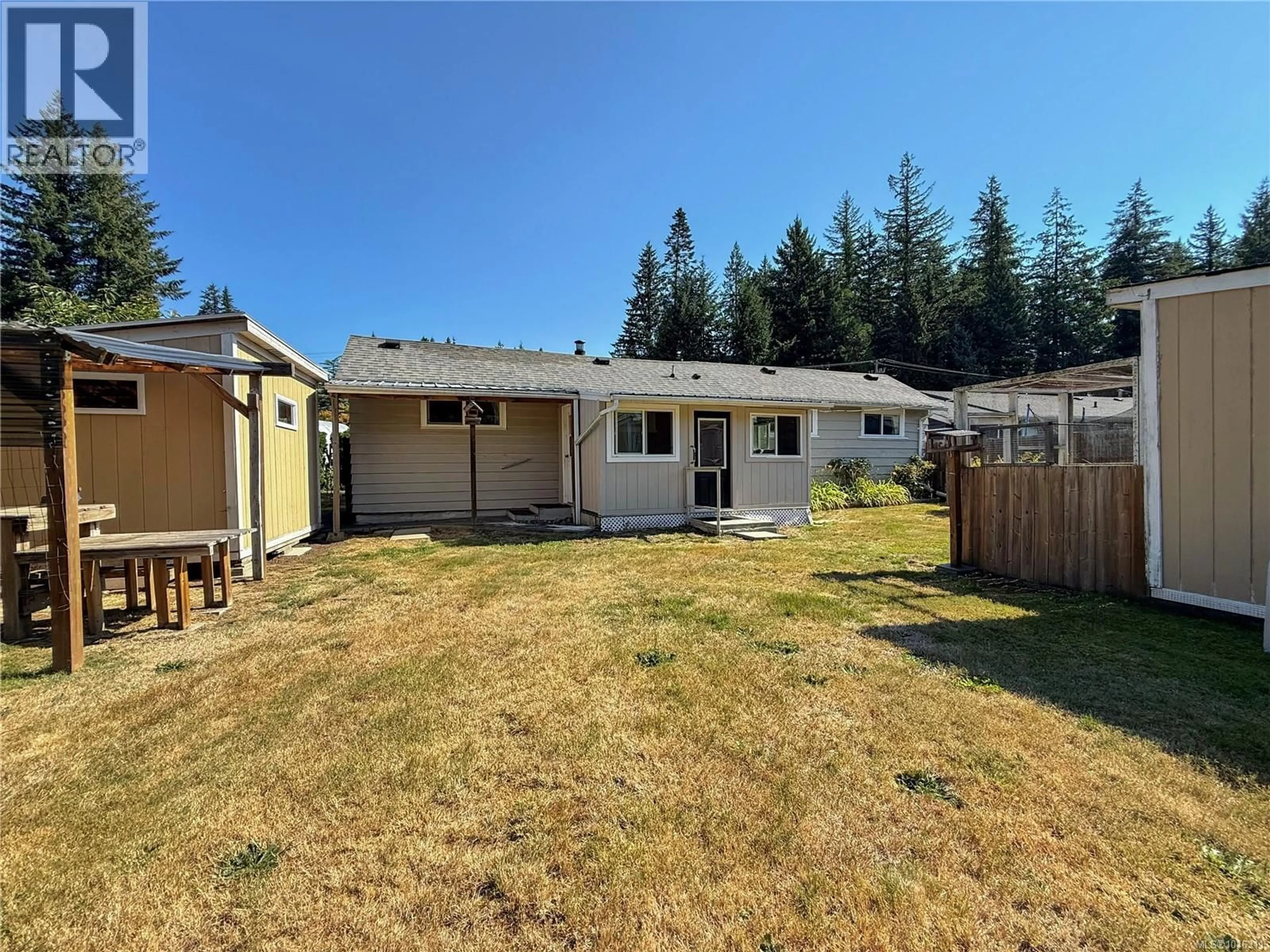 A pic from outside/outdoor area/front of a property/back of a property/a pic from drone, street for 2361 CAMPBELL RIVER ROAD, Campbell River British Columbia V9W4N9